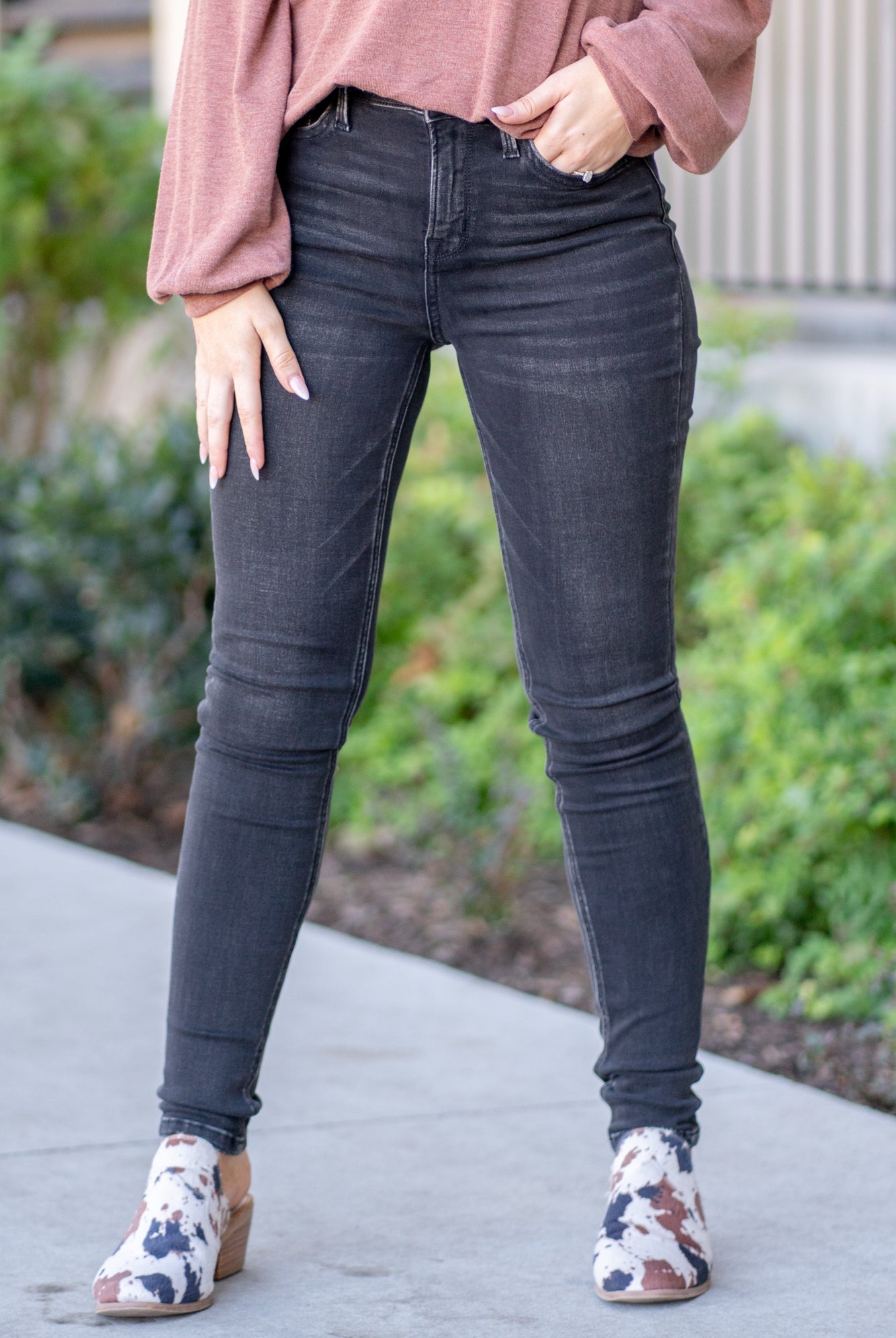 Flying Monkey Jeans These skinny jeans are all about comfort and style. Crafted from comfort stretch denim with super-soft fabric, they offer a snug yet cozy fit. The high-rise waist adds a trendy touch, and their ankle-length cut provides a modern look. These jeans are your perfect choice for effortless fashion and comfort. Color: Black Cut: Skinny, 28" Inseam Rise: High Rise, 10" Front Rise Cotton Blend Machine Wash Separately In Cold Water Stitching: Classic Fly: Zipper Style #: F4474