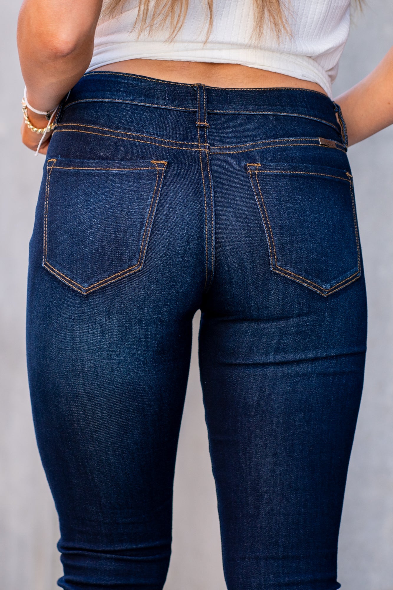 KanCan Jeans Collection: Core Style Color: Dark Wash Cut: Skinny, 29.5" Inseam* Rise: Mid-Rise, 8.5" Front Rise* 67% COTTON, 25% POLYESTER, 7% RAYON, 1% SPANDEX Stitching: Classic Fly: Zipper Style #: KC11245SD Contact us for any additional measurements or sizing. *Measured on the smallest size, measurements may vary by size.