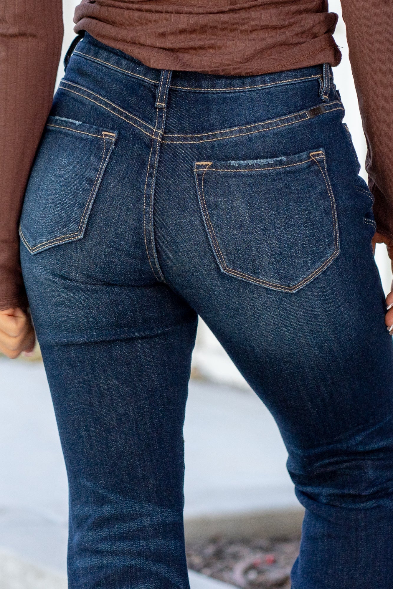 KanCan Jeans These high-rise flare jeans in a dark stone wash offer comfort stretch and a clean, non-distressed finish with a zip fly. Perfect for a polished and timeless look. Color: Dark Blue Cut: Flare, 34" Inseam* Rise: High-Rise, 10.5" Front Rise* Material: 99.3% COTTON, 0.7% SPANDEX Stitching: Classic Fly: Zipper Style #: KC7340D *Measured on the smallest size, measurements may vary by size.