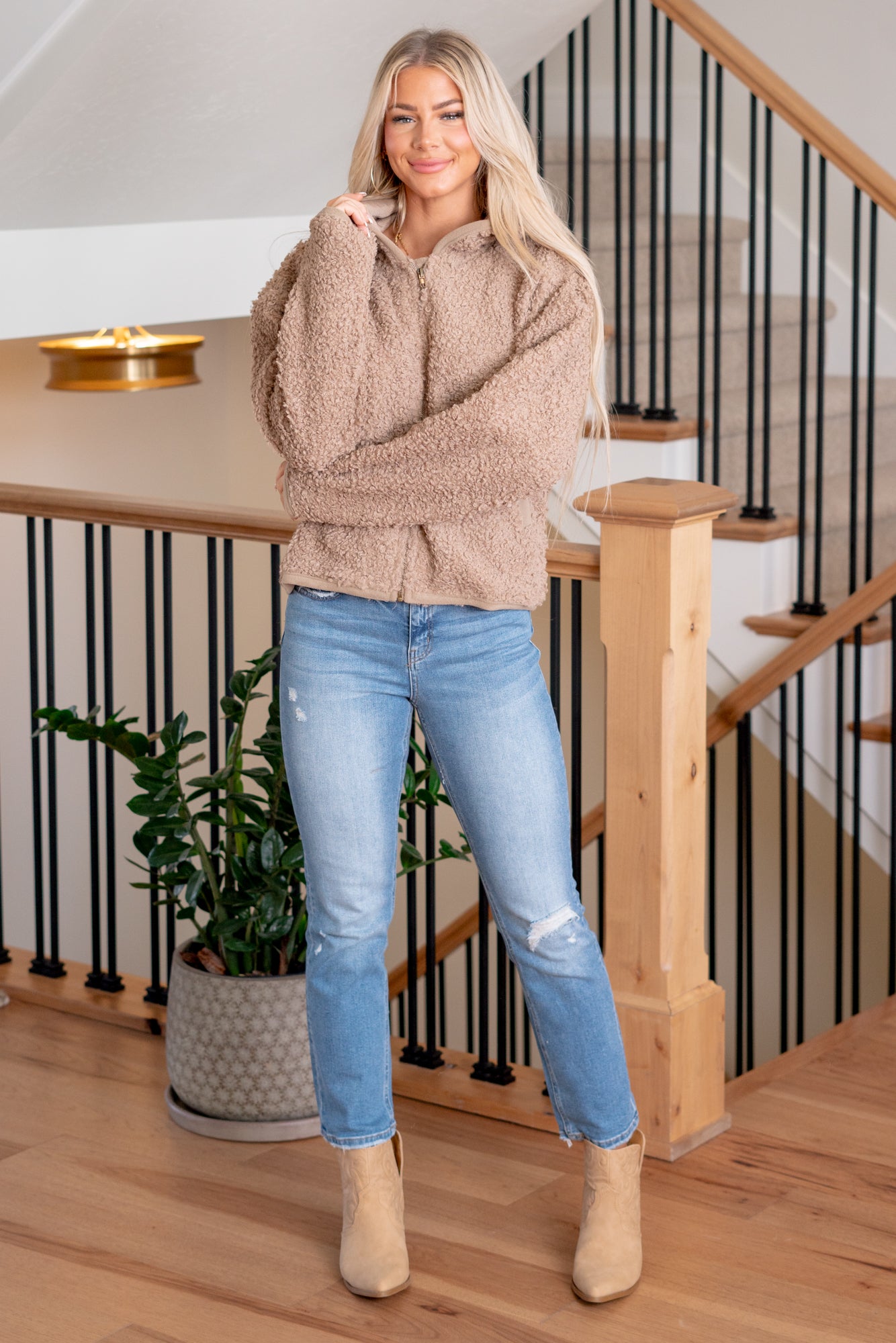 BiBi Step into ultimate coziness with our Comfy Sherpa Zip Up Hoodie featuring a convenient pocket. This hoodie is designed for comfort, warmth, and style. The plush sherpa fabric ensures a soft touch against your skin, while the zip-up design and hoodie provide versatility for your casual or outdoor wardrobe. Perfect for chilly days or relaxed outings, this hoodie with pockets is a cozy essential that combines fashion with functionality.