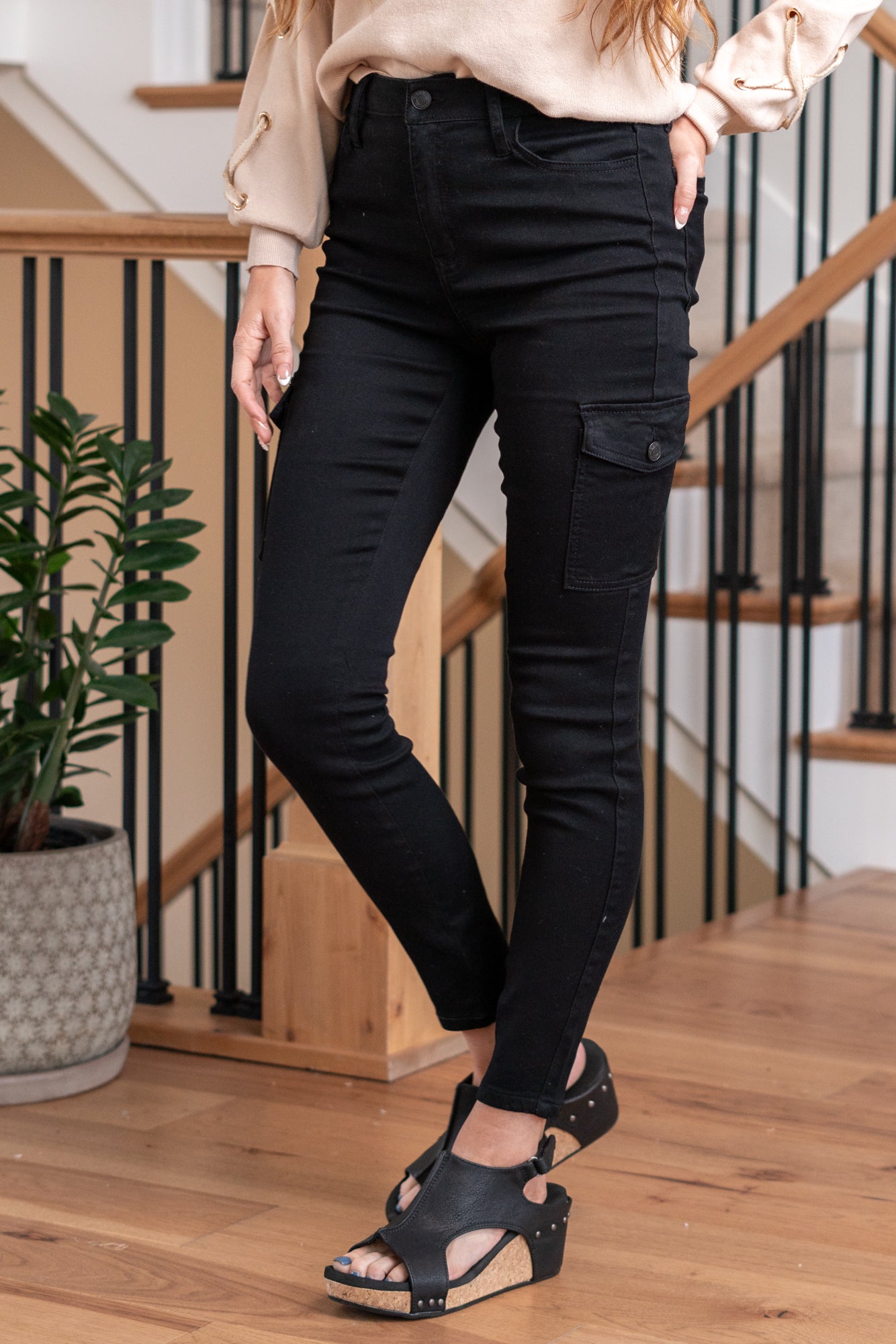 Cello Jeans Elevate your style with these High Rise Cargo Skinny Jeans in sleek black. Crafted from stretch fabric, they offer both comfort and a flattering fit. The cargo pockets bring a trendy touch to your outfit. Cut: Skinny, 29" Inseam* Rise:-Rise, 10" Front Rise* Color: Black 78% Cotton 20% Polyester 2% Spandex Fly: Zipper Style #: AM19021BLK