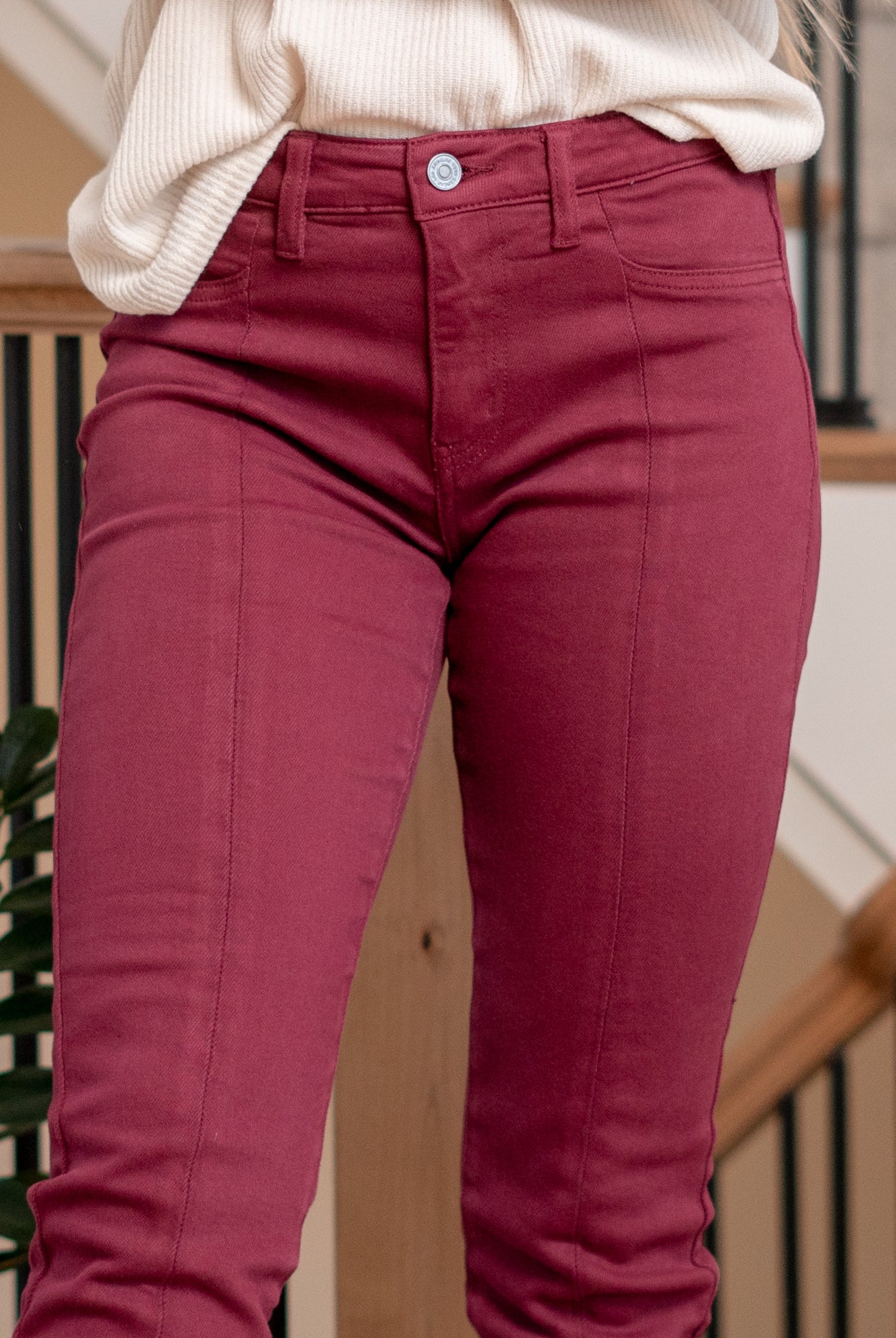 Belinda Mid Rise Skinny Straight Leg Jeans comes in three beautiful color tones. Made with stretchy denim fabric that hugs your body in the right places. This jean sits right at the waist for an easy fit that's both comfortable and chic. Features a front center slit, for an edgier look and feel. Color: Burgundy Cut: Skinny Straight, 27" Inseam* Rise: Mid-Rise, 9.5" Front Rise* Material: 94.8% Cotton, 4% t-400, 1.2% Spandex Stitching: Classic Fly: Zipper Style #: KC7453BU