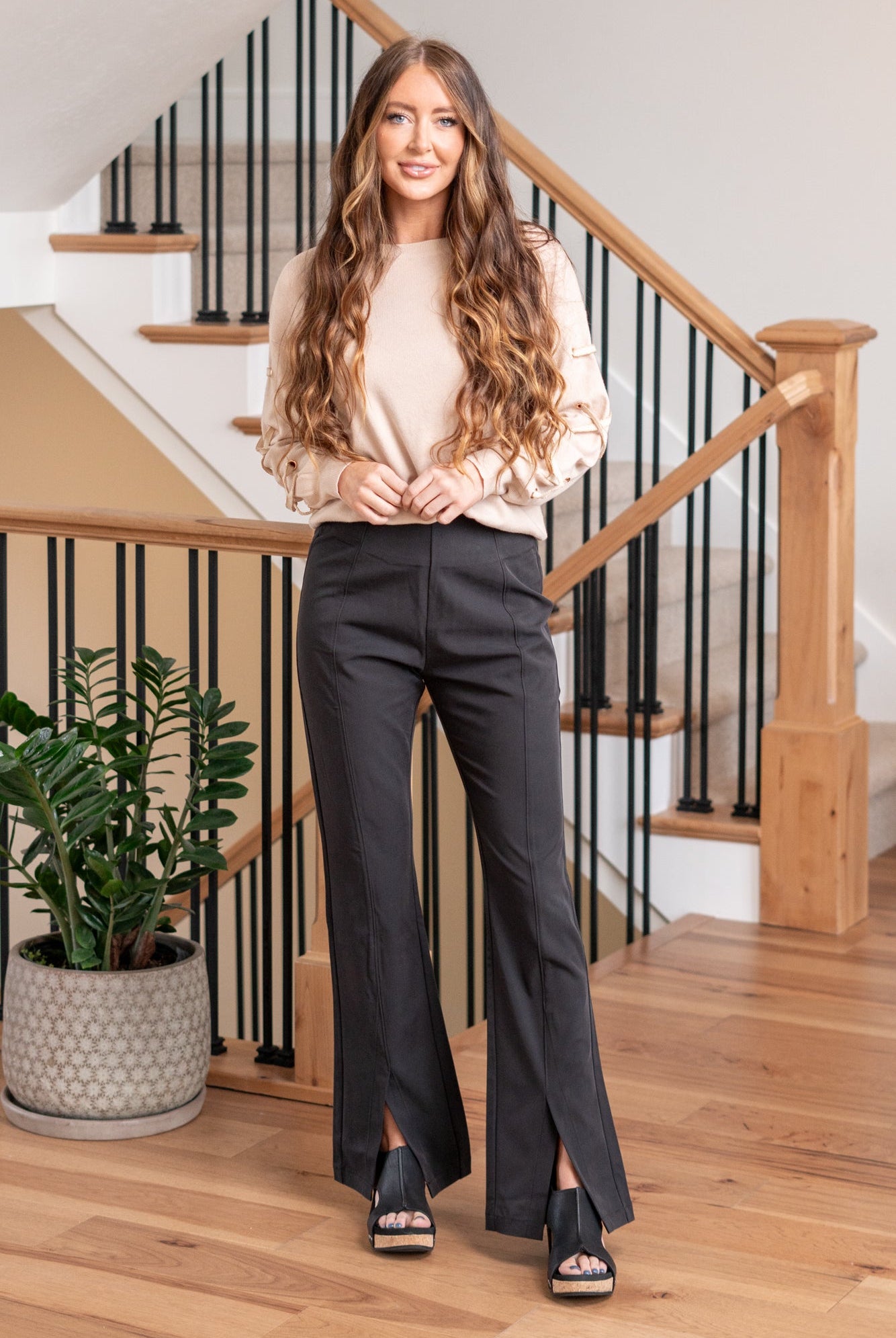 KanCan Jeans Ultra High Rise Sateen Flare Pants. Crafted from comfortable stretch non-denim fabric, these pants offer both style and flexibility. They feature an invisible zipper with hook and closure at the back, a regular hem with a front slit, and seam details at the front and back, adding a unique and trendy touch to your outfit. Color: Black Cut: FIT, 32" Inseam* Rise:-Rise, 12" Front Rise* Material: 68% Rayon, 32% Polyester Stitching: Classic Fly: Zipper Style #: KC2050BK