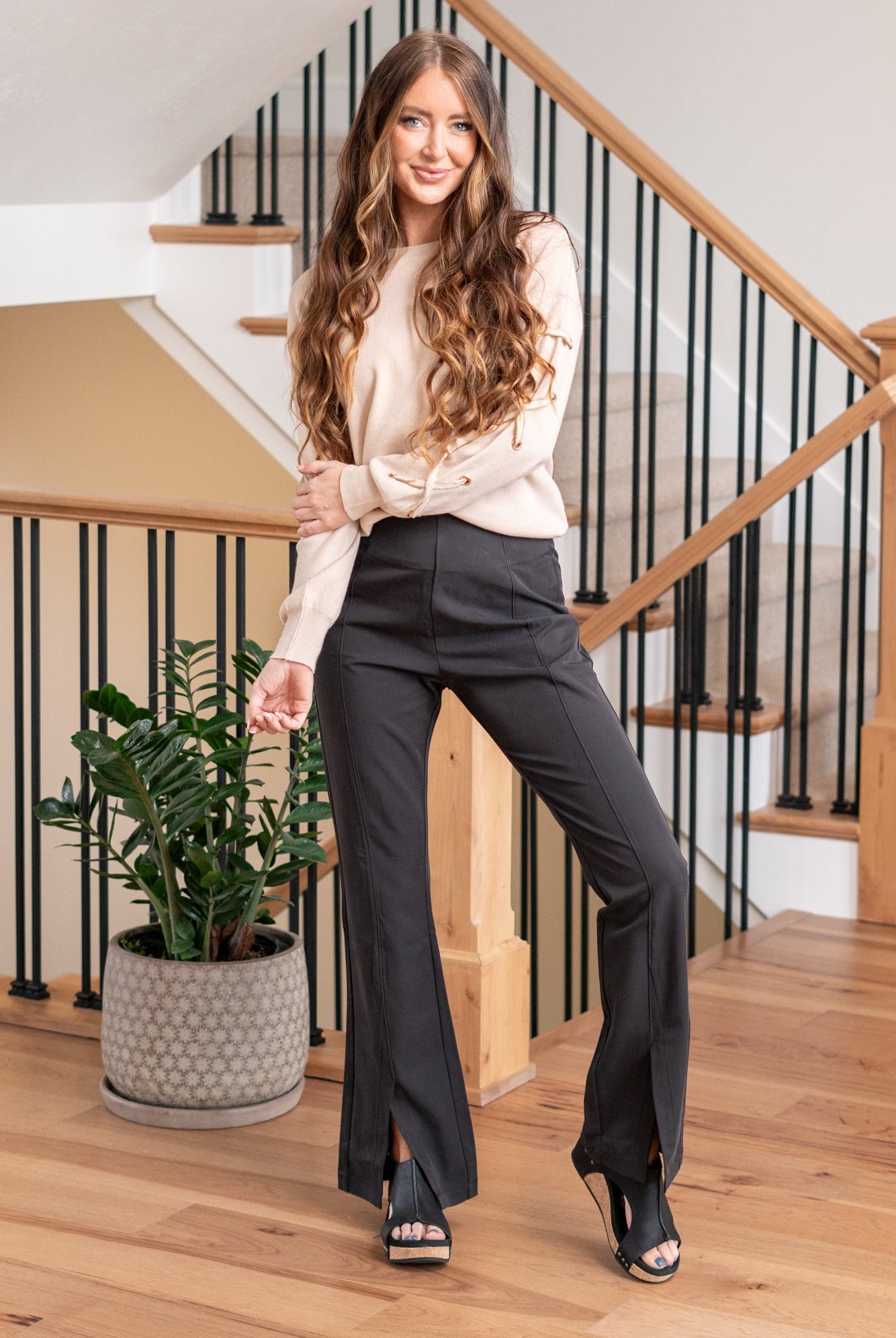 KanCan Jeans Ultra High Rise Sateen Flare Pants. Crafted from comfortable stretch non-denim fabric, these pants offer both style and flexibility. They feature an invisible zipper with hook and closure at the back, a regular hem with a front slit, and seam details at the front and back, adding a unique and trendy touch to your outfit. Color: Black Cut: FIT, 32" Inseam* Rise:-Rise, 12" Front Rise* Material: 68% Rayon, 32% Polyester Stitching: Classic Fly: Zipper Style #: KC2050BK