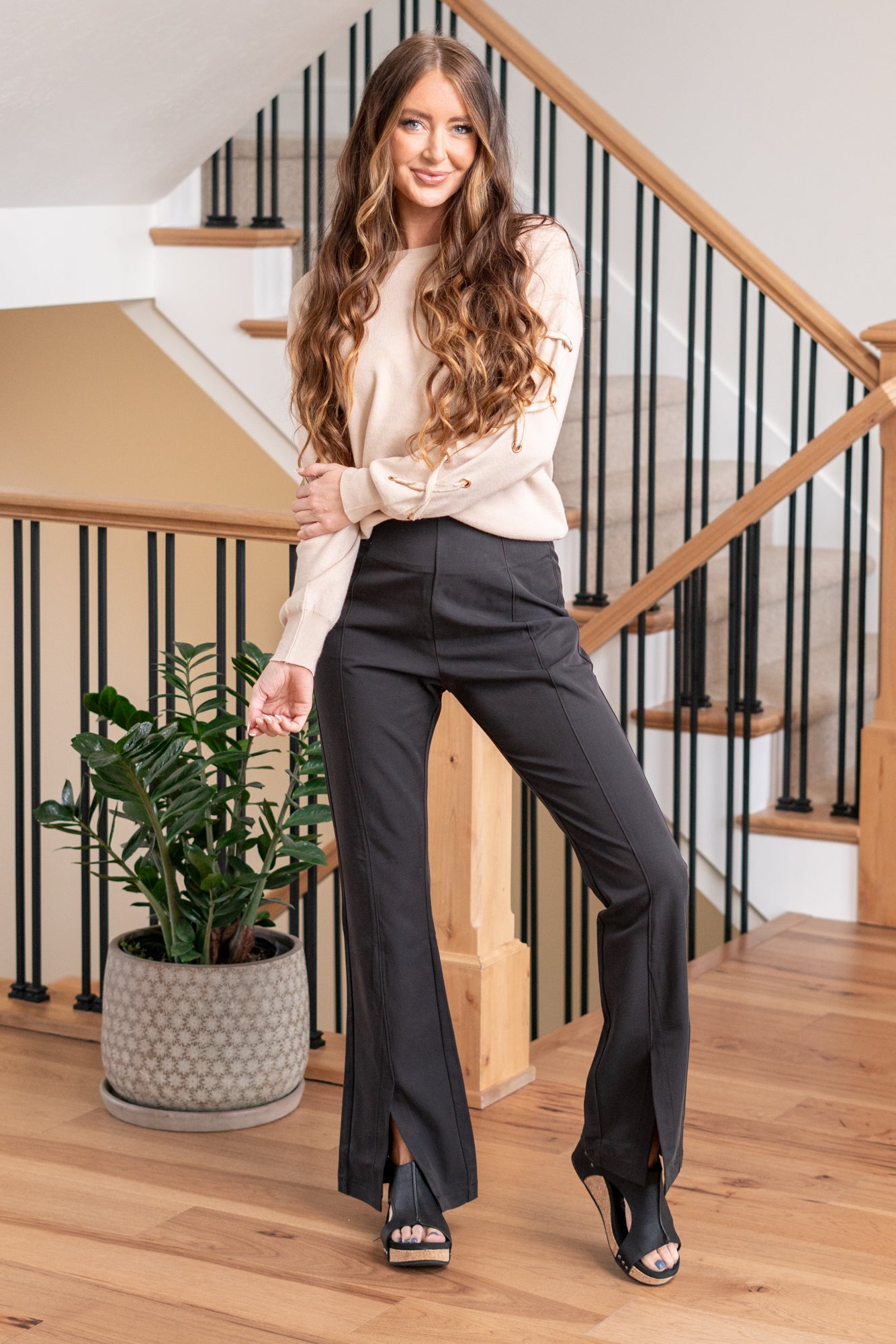 KanCan Jeans Ultra High Rise Sateen Flare Pants. Crafted from comfortable stretch non-denim fabric, these pants offer both style and flexibility. They feature an invisible zipper with hook and closure at the back, a regular hem with a front slit, and seam details at the front and back, adding a unique and trendy touch to your outfit. Color: Black Cut: FIT, 32" Inseam* Rise:-Rise, 12" Front Rise* Material: 68% Rayon, 32% Polyester Stitching: Classic Fly: Zipper Style #: KC2050BK