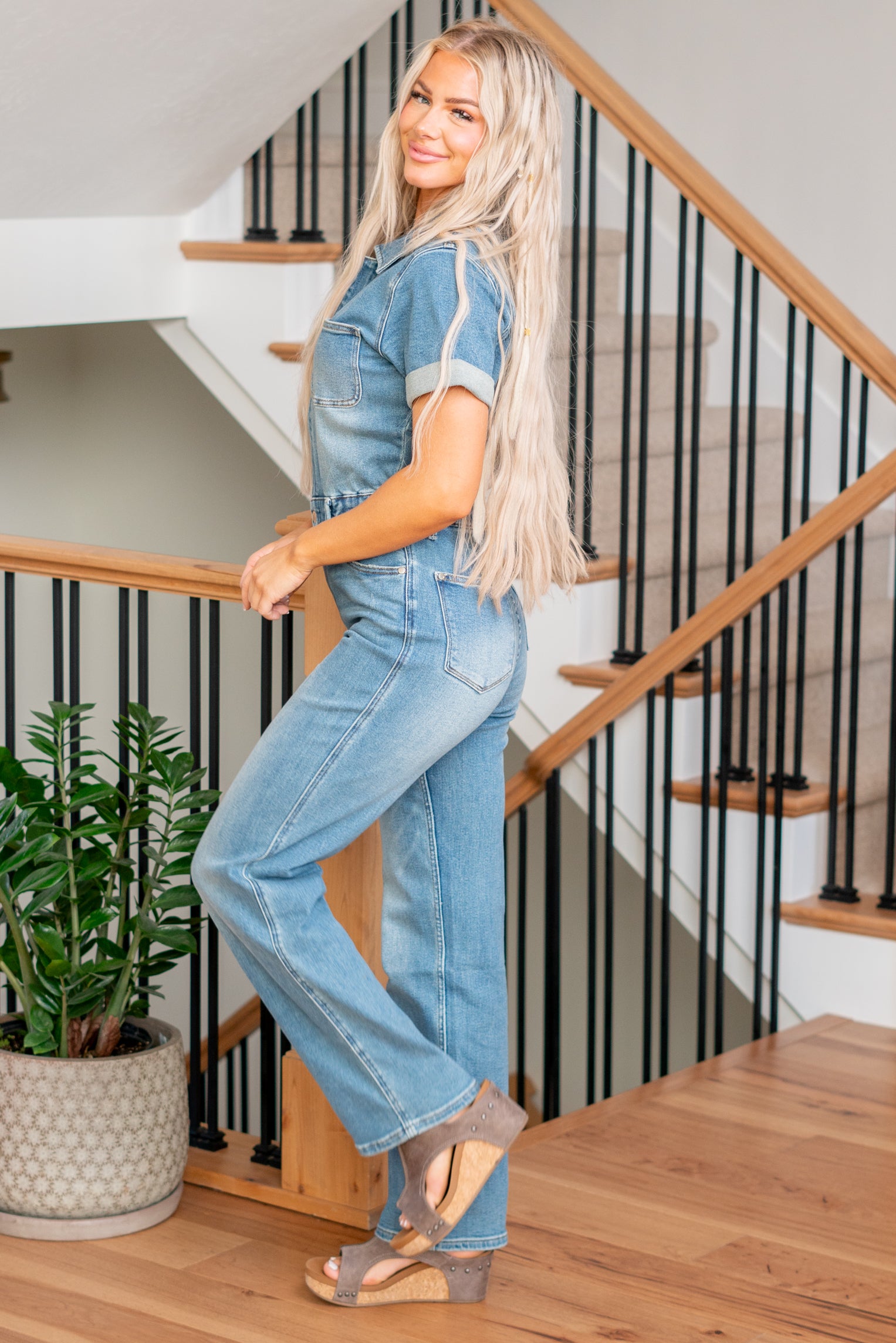 Judy Blue This jumpsuit features a flattering high waist and a chic straight fit, complemented by a medium wash for a timeless look. Embrace both fashion and functionality in this on-trend piece designed for ultimate comfort and style. Elevate your wardrobe with the Aspen jumpsuit, the ideal choice for a stylish and confident statement. Color: Medium Wash Cut: Straight, 32" Inseam* Rise: -Rise, 14" Front Rise* Material: 94% Cotton / 5% Polyester / 1% Spandex Stitching: Classic Fly: Zipper Style #: 88722PL