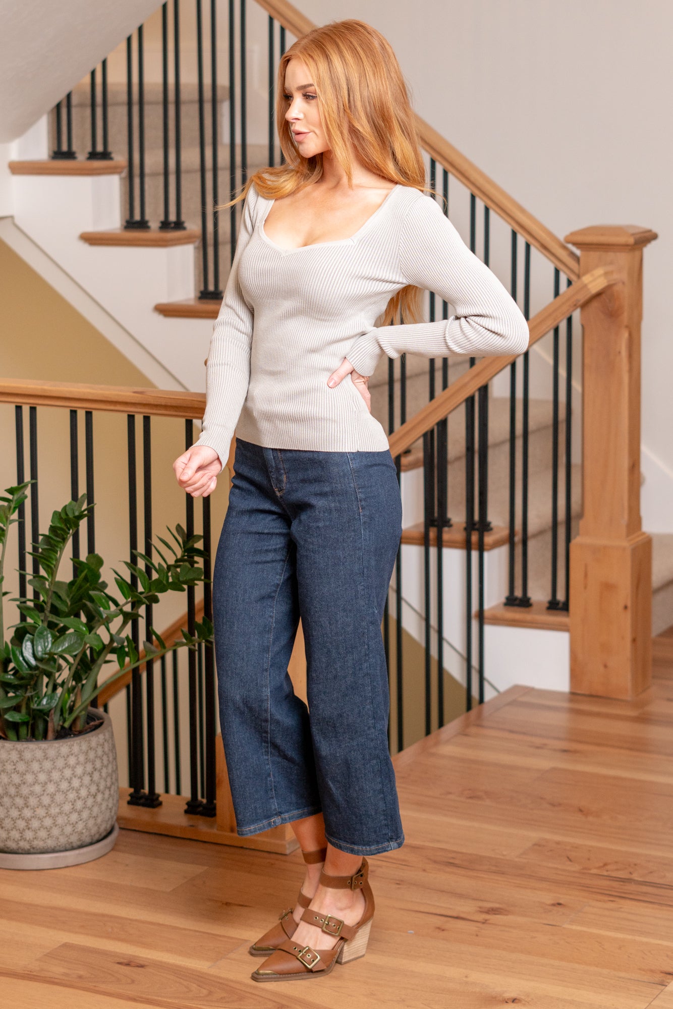 Hem & Thread Introducing our ribbed sweater, featuring a flattering sweetheart neckline and long sleeves. This top adds a touch of elegance to your look, combining comfort with style in a playful two-tone design. Color: Light Grey Neckline: Sweetheart Material: 75% VISCOSE 25% NYLON Style #: 39157-LTGrey Contact us for any additional measurements or sizing.