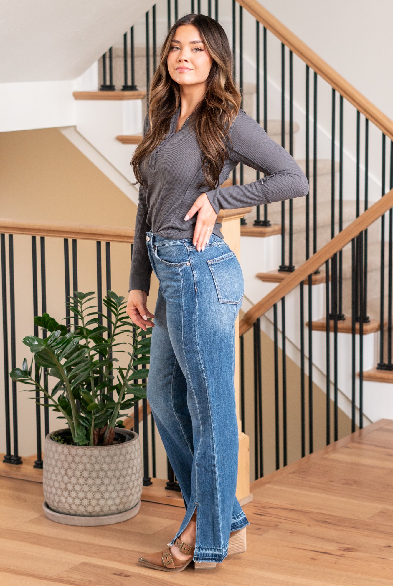 KanCan Jeans Embrace the 90's style with these Straight Leg Jeans. With styling & feel reminiscent of the era, they come with a modern twist featuring a waist seam, cut seam, slit, and a trendy release hem. These jeans are perfect for a stylish and nostalgic look. Color: Medium Blue Cut: Straight, 31" Inseam* Rise:-Rise, 11 3/4" Front Rise* Material: 100% Cotton, Rigid Denim Stitching: Classic Fly: Zipper Style #: KC8721M