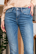 VERVET by Flying Monkey Jeans  A perfect fusion of comfort and timeless style. These jeans feature a flattering high-rise fit and a contemporary slim straight leg, providing a versatile and chic silhouette. Elevate your denim game with the Jeanne jeans, offering a trendy and comfortable option that seamlessly combines modern design with a touch of classic elegance.