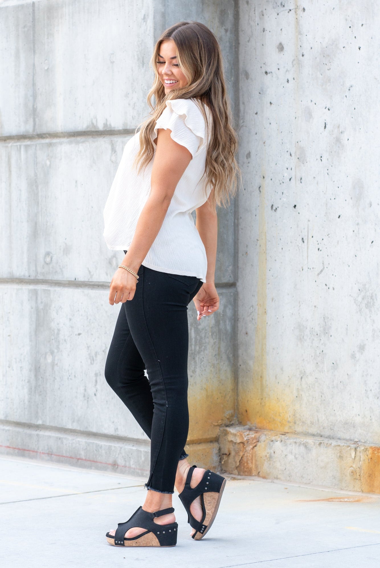 KanCan Jeans These high rise medium wash skinny jeans have a spilt fray hem and fit above the ankles so you can show off you sandals this summer. Color: Black Cut: Skinny, 26.5" Inseam Rise: High-Rise, 10.5" Front Rise 72%COTTON, 25% POLYESTER, 3% SPANDEX Stitching: Classic Fly: Zipper Style #: KC8604BBK Contact us for any additional measurements or sizing.