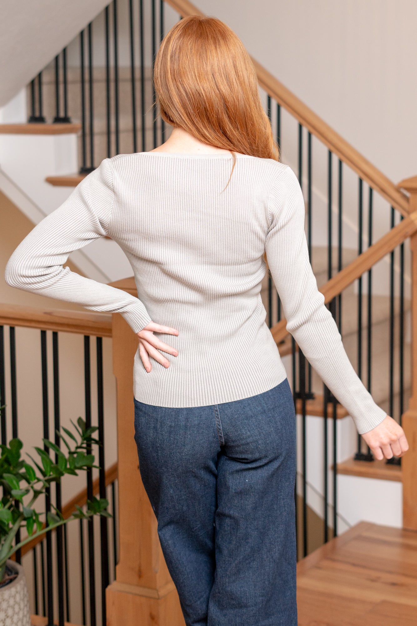 Hem & Thread Introducing our ribbed sweater, featuring a flattering sweetheart neckline and long sleeves. This top adds a touch of elegance to your look, combining comfort with style in a playful two-tone design. Color: Light Grey Neckline: Sweetheart Material: 75% VISCOSE 25% NYLON Style #: 39157-LTGrey Contact us for any additional measurements or sizing.