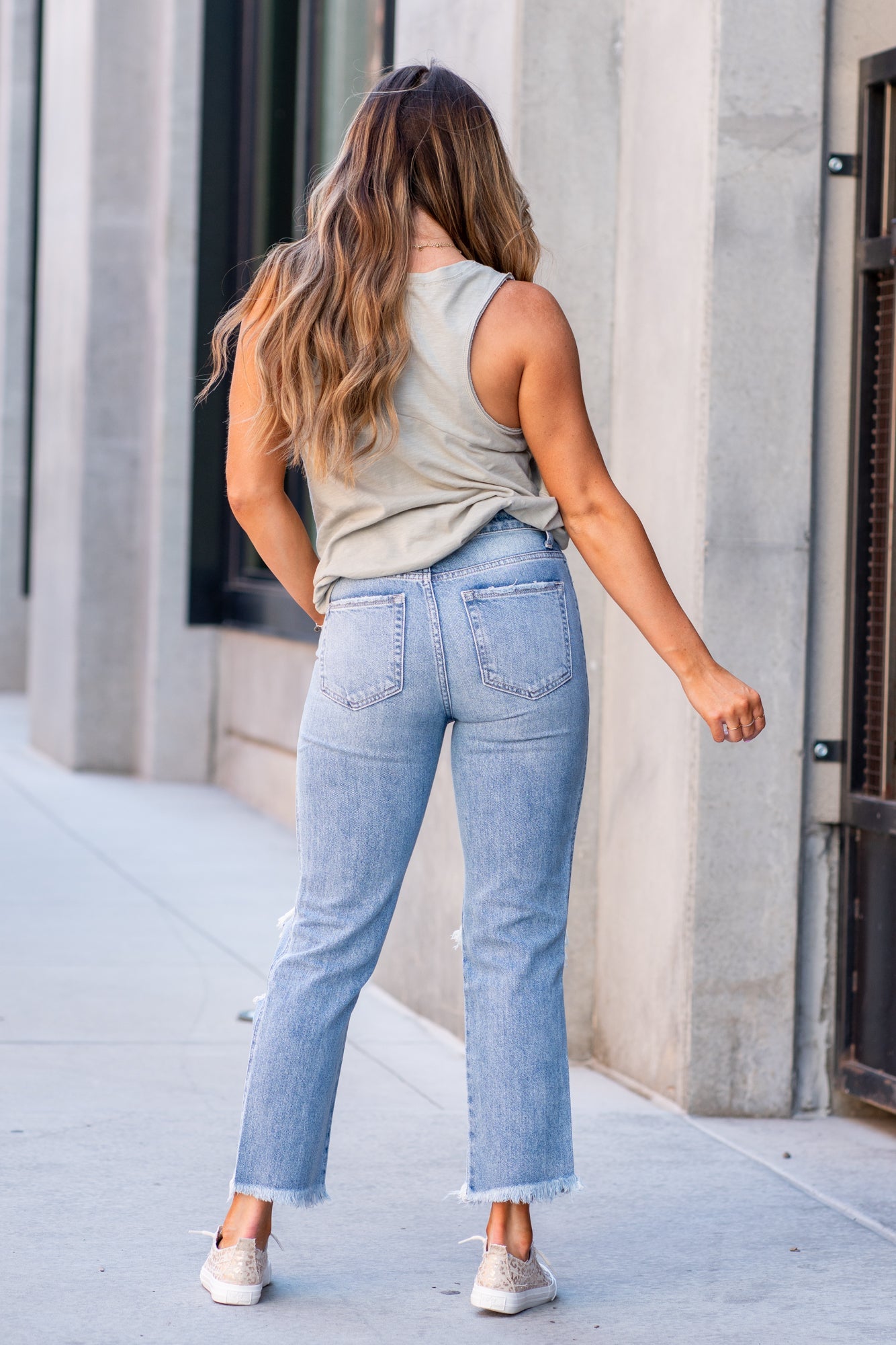 Flying Monkey Jeans Non-stretch denim with distressed detail and relaxed legs. Look fitted style with a hidden button-up and relaxed feel. Authentic rigid jeans with a vintage hem. Collection: Core Style Name: Apart Cut: Mom Fit, 28" Straight Rise: High Rise, 11" Front Rise 100% Cotton Machine Wash Separately In Cold Water Stitching: Classic Fly: Zipper Style #: Y3920 Contact us for any additional measurements or sizing.