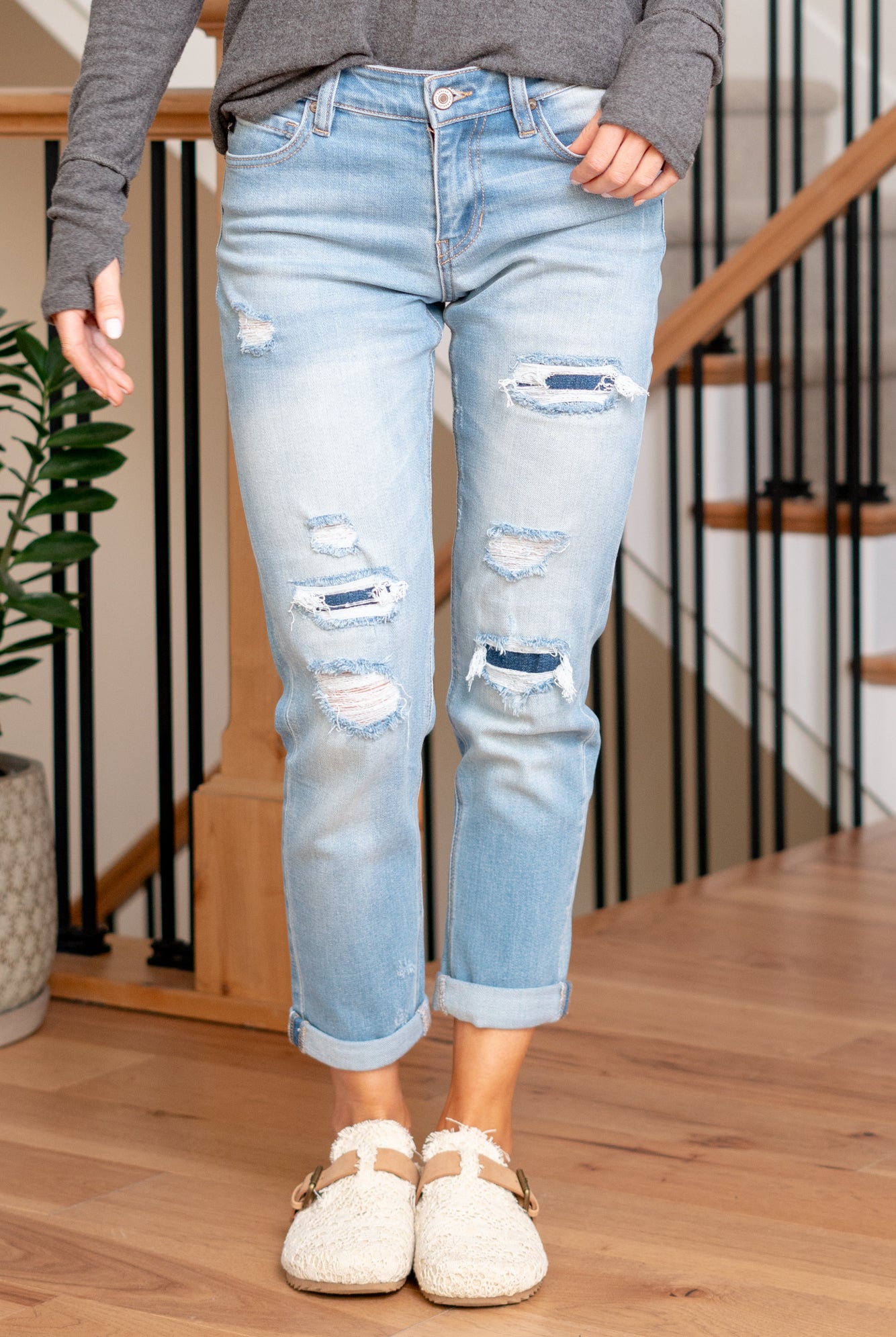KanCan Jeans Upgrade your casual wardrobe with the Evelyn Mid Rise Double Cuff Hem Slim Boyfriend jeans. These jeans feature a comfortable mid-rise and a relaxed slim boyfriend fit, striking the perfect balance between style and comfort. The double cuff hem adds a touch of flair, providing a modern and on-trend look.