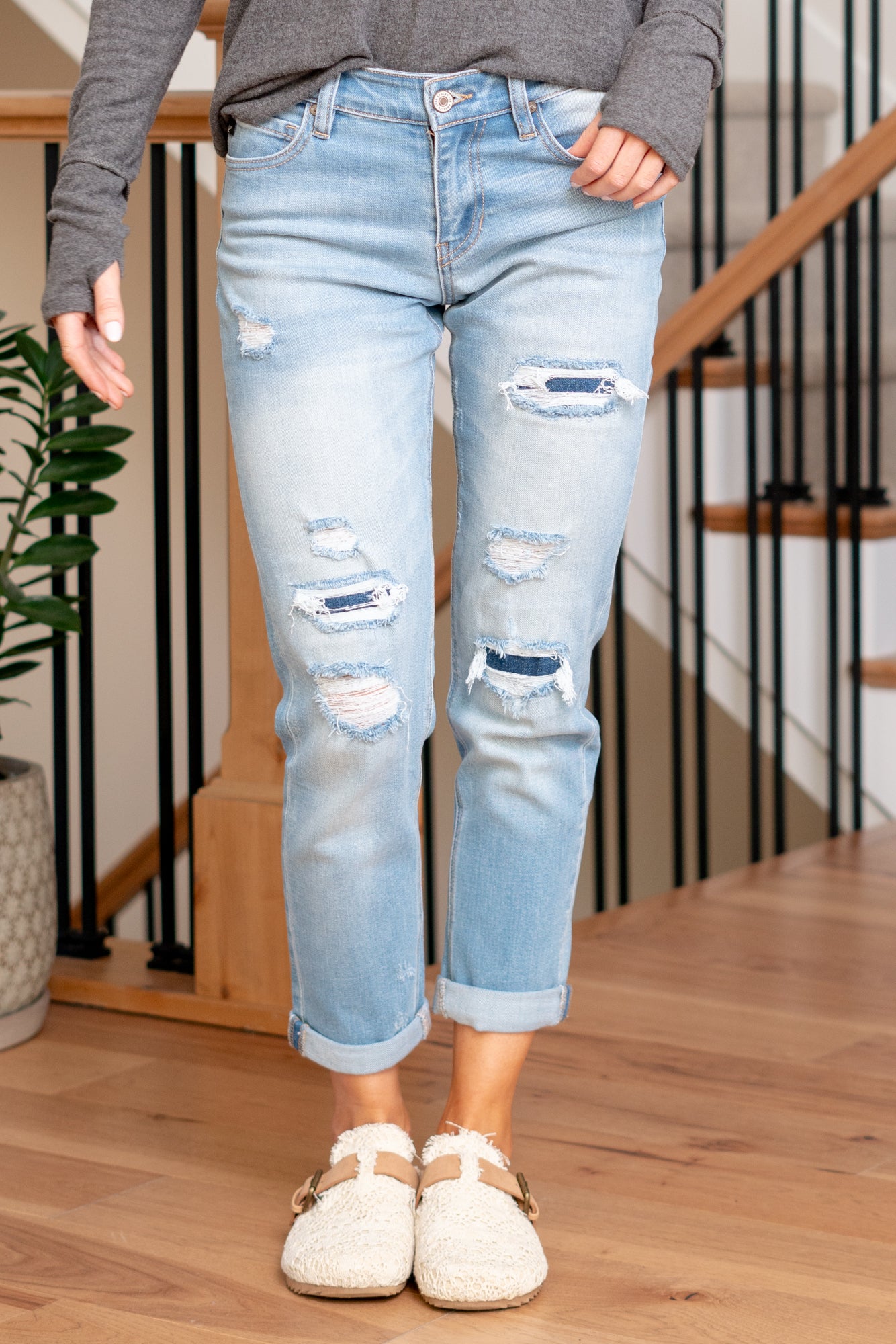 KanCan Jeans Upgrade your casual wardrobe with the Evelyn Mid Rise Double Cuff Hem Slim Boyfriend jeans. These jeans feature a comfortable mid-rise and a relaxed slim boyfriend fit, striking the perfect balance between style and comfort. The double cuff hem adds a touch of flair, providing a modern and on-trend look.