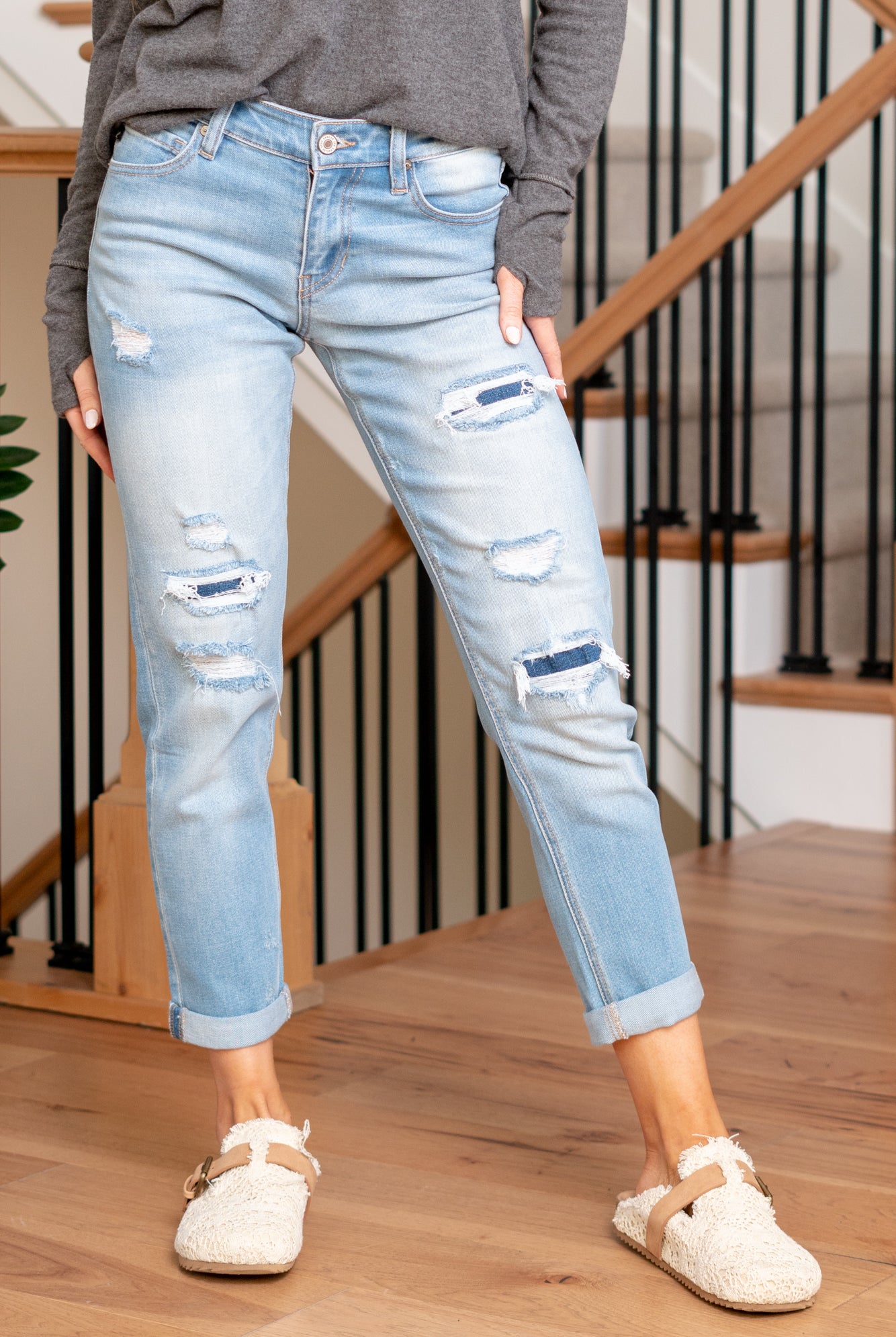 KanCan Jeans Upgrade your casual wardrobe with the Evelyn Mid Rise Double Cuff Hem Slim Boyfriend jeans. These jeans feature a comfortable mid-rise and a relaxed slim boyfriend fit, striking the perfect balance between style and comfort. The double cuff hem adds a touch of flair, providing a modern and on-trend look.