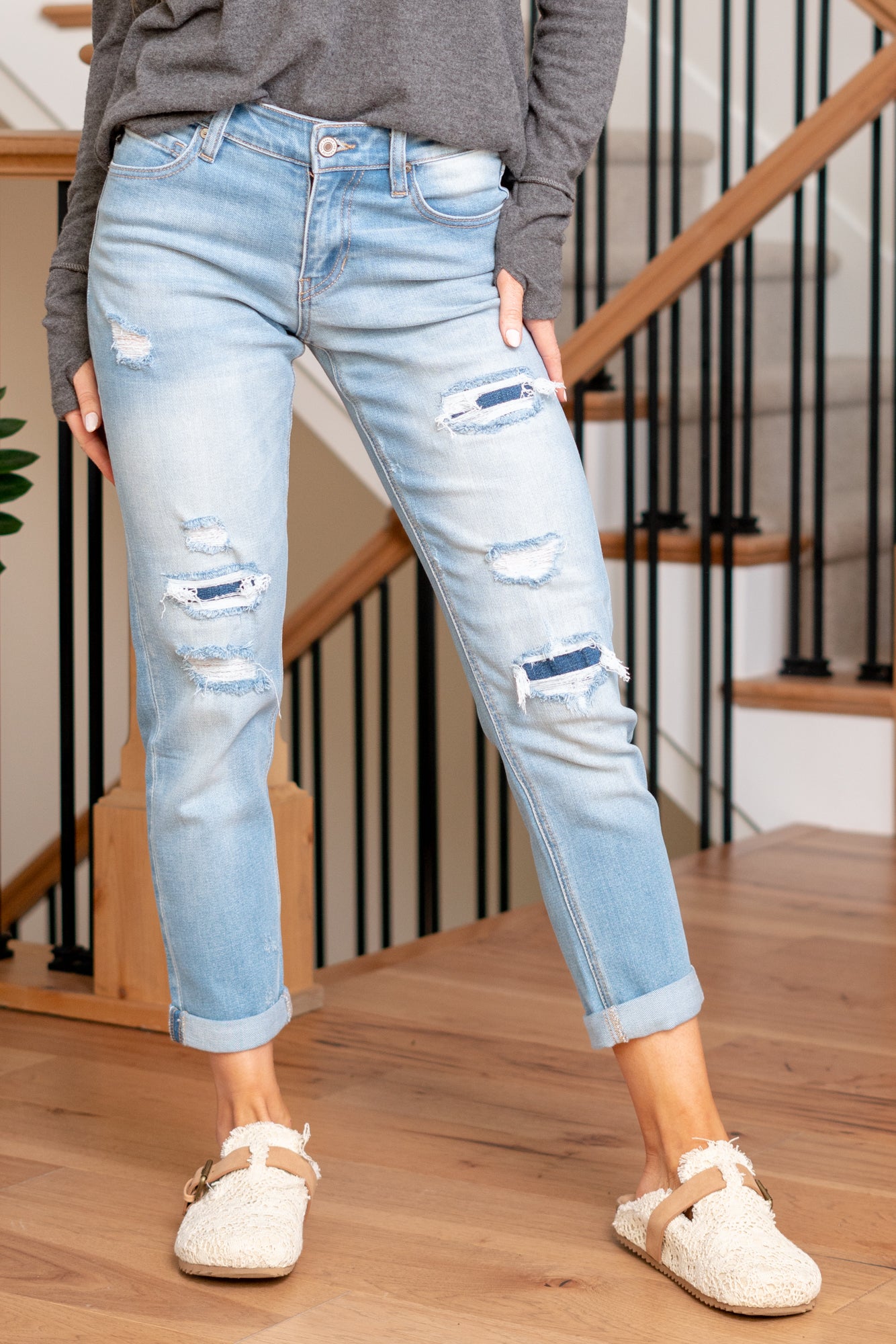 KanCan Jeans Upgrade your casual wardrobe with the Evelyn Mid Rise Double Cuff Hem Slim Boyfriend jeans. These jeans feature a comfortable mid-rise and a relaxed slim boyfriend fit, striking the perfect balance between style and comfort. The double cuff hem adds a touch of flair, providing a modern and on-trend look.