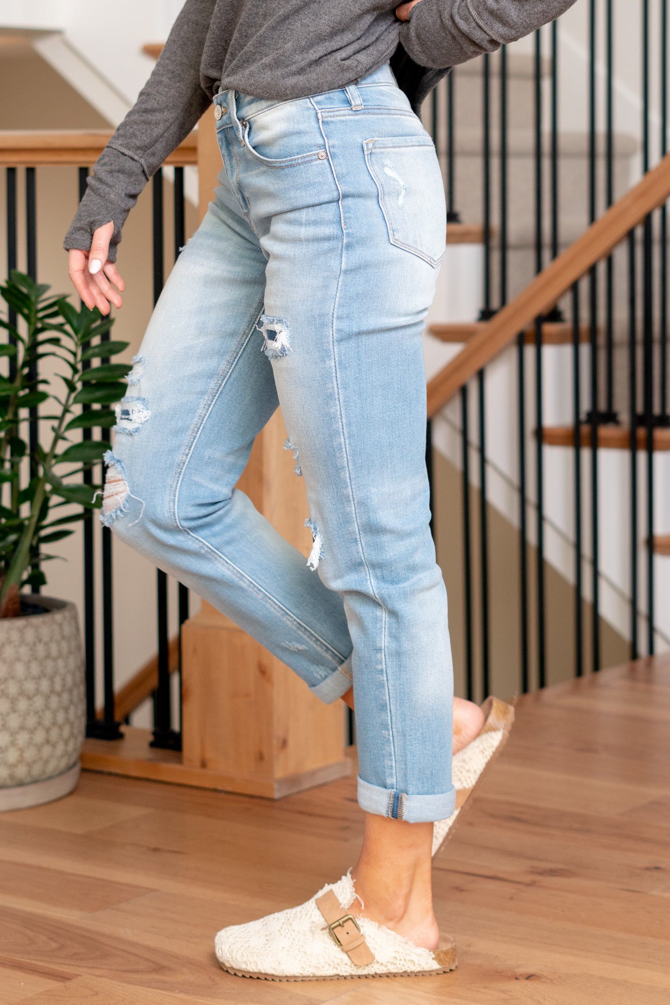 KanCan Jeans Upgrade your casual wardrobe with the Evelyn Mid Rise Double Cuff Hem Slim Boyfriend jeans. These jeans feature a comfortable mid-rise and a relaxed slim boyfriend fit, striking the perfect balance between style and comfort. The double cuff hem adds a touch of flair, providing a modern and on-trend look.