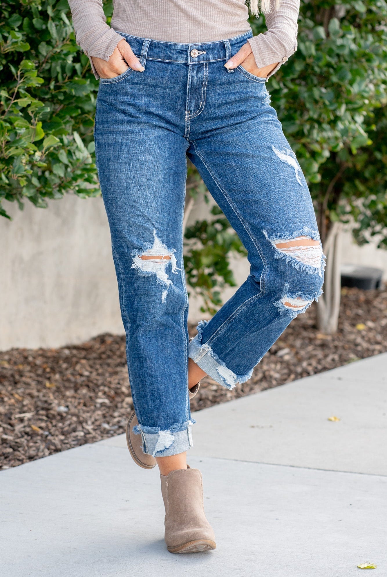 KanCan Jeans These mid-rise boyfriend jeans hit at exactly the right spot on your waist and with some spandex, these will stretch as you wear and get super comfy! Color: Dark Blue Wash Cut: Cuffed Boyfriend, 26" Inseam* Rise: Mid-Rise, 9.25" Front Rise* 99% COTTON, 1% SPANDEX Stitching: Classic Fly: Zipper Style #: KC8652D Contact us for any additional measurements or sizing.