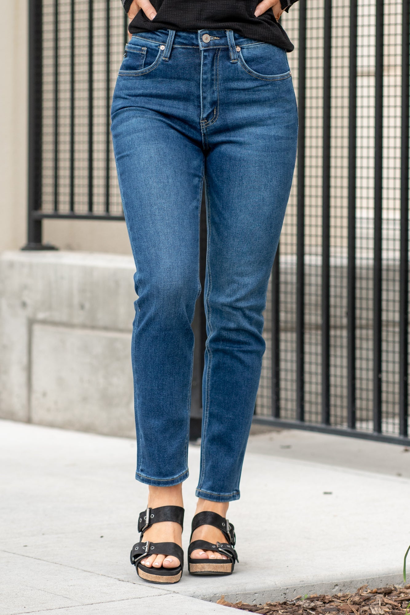 KanCan Jeans With a high waist and straight fit, these will be your go-to jeans that will never go out of style. Color: Dark Blue Cut: Straight Fit, 28.5" Inseam* Rise: High-Rise, 11" Front Rise* COTTON 75%, TENCEL 23%,SPANDEX 2% Fly: Zipper Style #: KC11252D Contact us for any additional measurements or sizing. *Measured on the smallest size, measurements may vary by size. Sarah wears a size 25 in jeans, a small in tops, and 8 in shoes. She is wearing size 25 in these jeans.