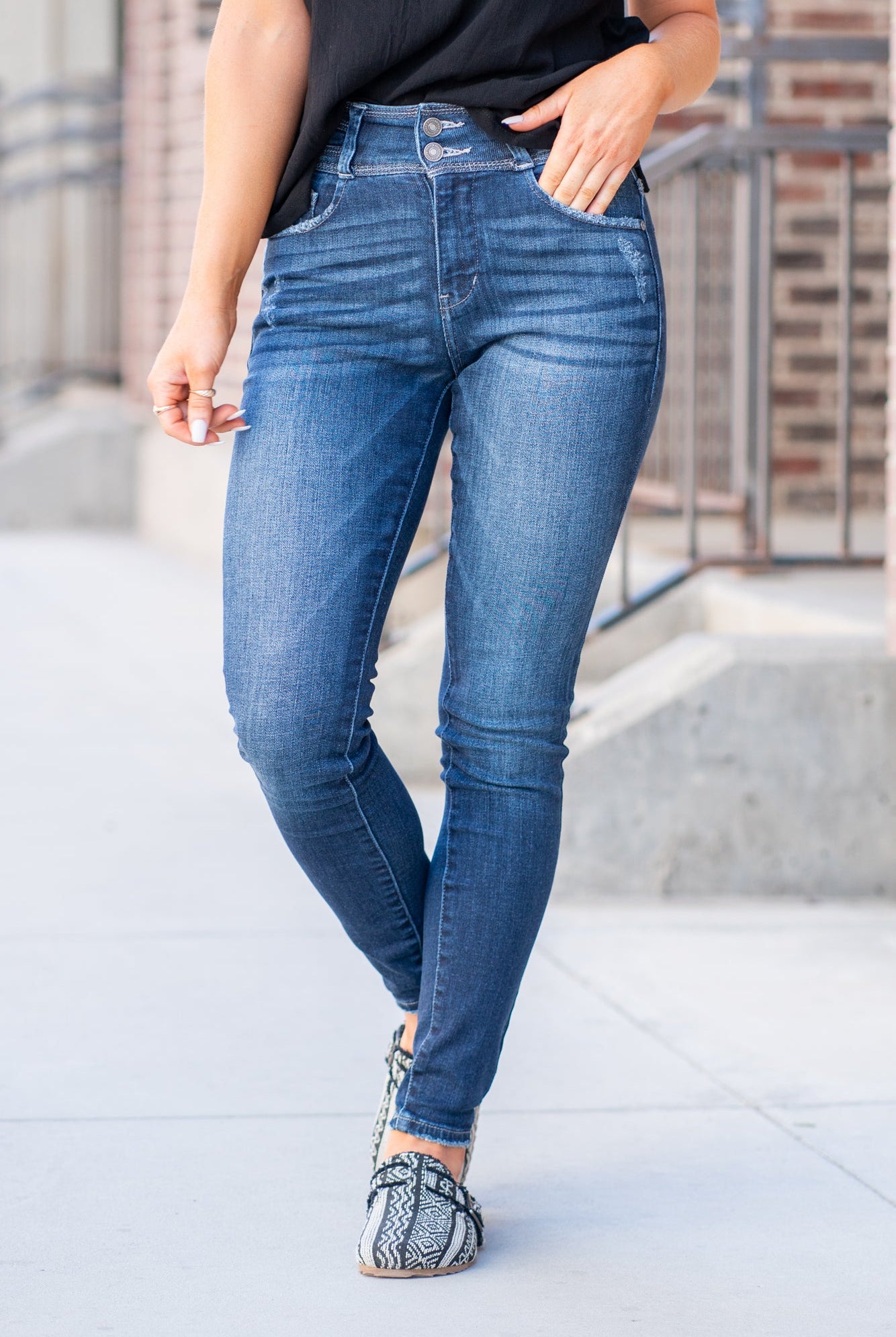 KanCan Jeans Color: Dark Blue Cut: Skinny, 29" Inseam Rise: Ultra High-Rise, 11" Front Rise COTTON 93% POLYESTER 6% SPANDEX 1% Stitching: Classic Fly: Zipper, Two Buttons Style #: KC9254D Contact us for any additional measurements or sizing. *Measured on the smallest size, measurements may vary by size. Sarah wears a size 25 in jeans, a small in tops, and 8 in shoes. She is wearing size 25 in these jeans.