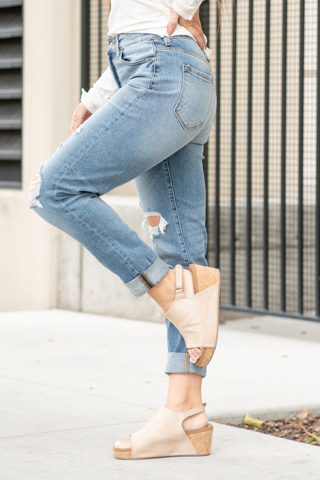 KanCan Jeans These mom jeans will become your go-to! Pair these girlfriend mom fit with booties and a tee for an easy fall look. Color: Medium Blue Wash Cut: Straight Fit, 30" Inseam* Rise: High-Rise, 11" Front Rise* 99% COTTON 1% SPANDEX Fly: Zipper Style #: KC8403D Contact us for any additional measurements or sizing. *Measured on the smallest size, measurements may vary by size. Alyssa wears a size 25 in jeans, a small in tops, and 8 in shoes. She is wearing size 3 in these jeans.