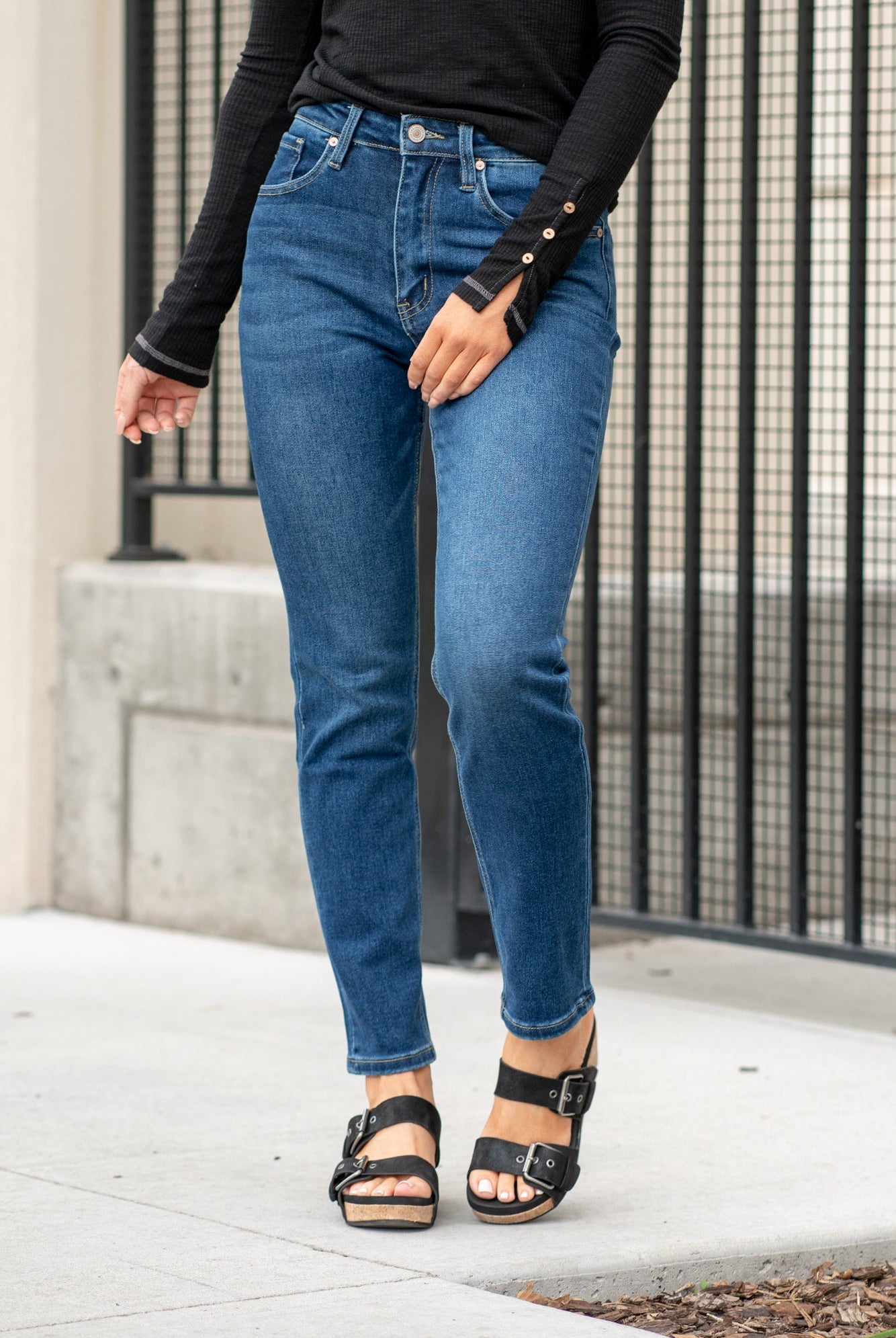 KanCan Jeans With a high waist and straight fit, these will be your go-to jeans that will never go out of style. Color: Dark Blue Cut: Straight Fit, 28.5" Inseam* Rise: High-Rise, 11" Front Rise* COTTON 75%, TENCEL 23%,SPANDEX 2% Fly: Zipper Style #: KC11252D Contact us for any additional measurements or sizing. *Measured on the smallest size, measurements may vary by size. Sarah wears a size 25 in jeans, a small in tops, and 8 in shoes. She is wearing size 25 in these jeans.