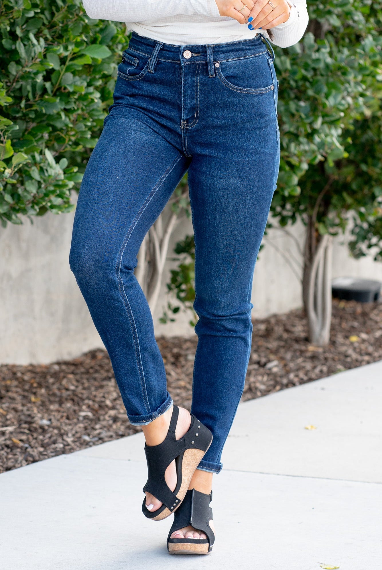 KanCan Jeans With a high waist and cigarette straight fit, these will be your go-to jeans that will never go out of style. Color: Dark Blue Cut: Straight Fit, 29" Inseam* Rise: High-Rise, 10.5" Front Rise* 75%COTTON, 23%TENCEL 2%SPANDEX Fly: Zipper Style #: KC4009D Contact us for any additional measurements or sizing. *Measured on the smallest size, measurements may vary by size.