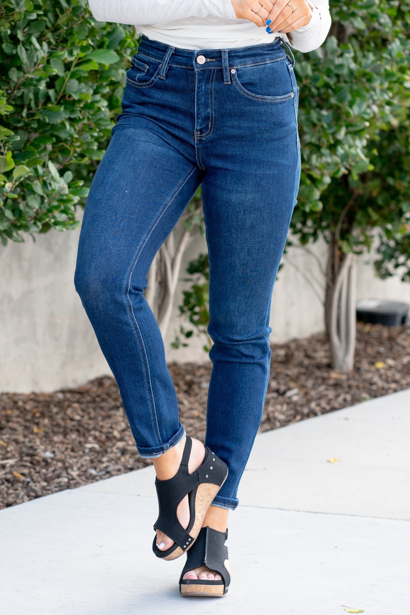 KanCan Jeans With a high waist and cigarette straight fit, these will be your go-to jeans that will never go out of style. Color: Dark Blue Cut: Straight Fit, 29" Inseam* Rise: High-Rise, 10.5" Front Rise* 75%COTTON, 23%TENCEL 2%SPANDEX Fly: Zipper Style #: KC4009D Contact us for any additional measurements or sizing. *Measured on the smallest size, measurements may vary by size.