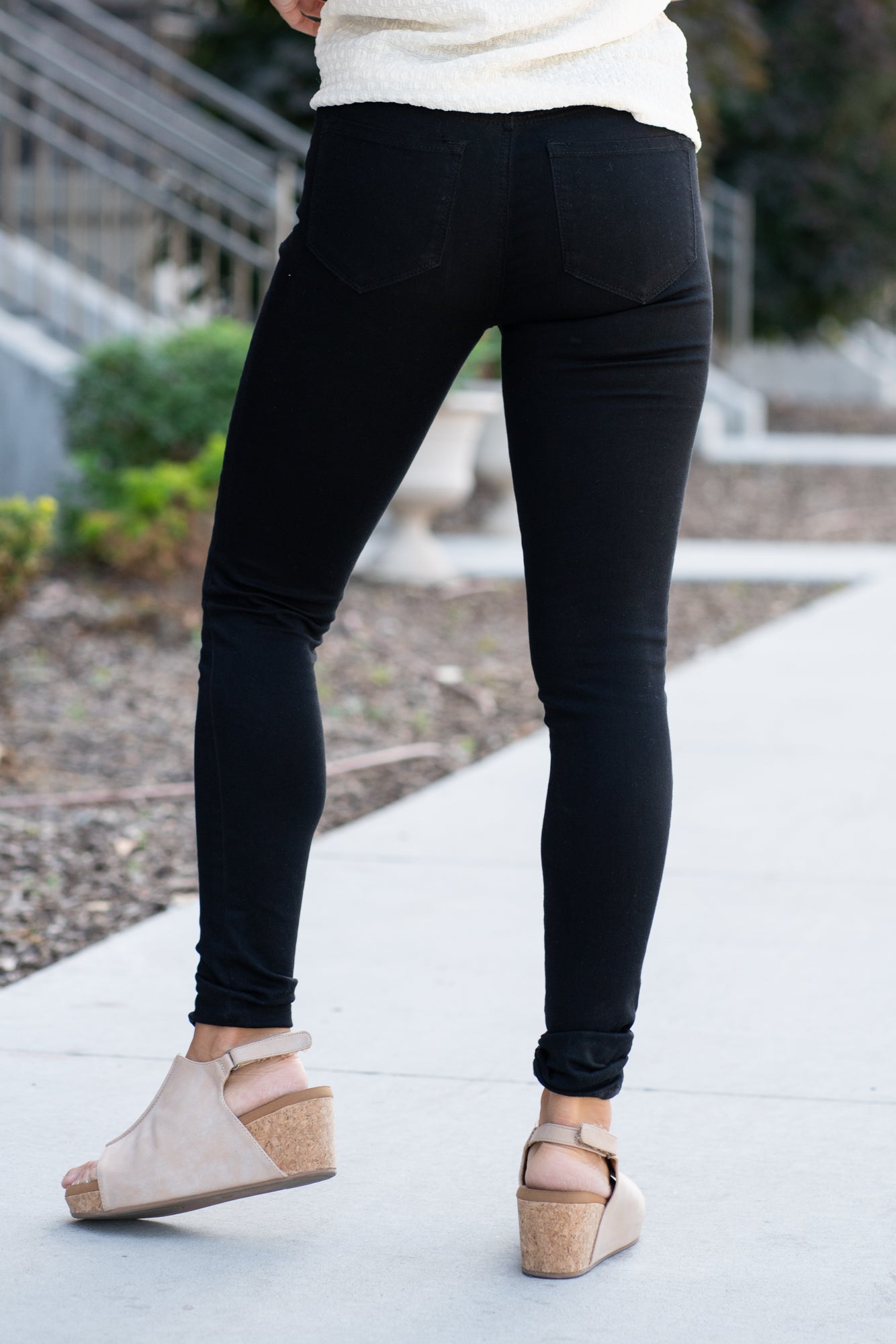 KanCan Jeans These are the staple black skinny jeans from KanCan. Collection: Core Style Color: Black Cut: Ankle Skinny, 28" Inseam Rise: High-Rise, 9.5" Front Rise Material: 65% Cotton 33% Rayon 2% Elastane Stitching: Classic Fly: Zipper Style #: KC6009BK Contact us for any additional measurements or sizing *Measured on the smallest size, measurements may vary by size. Alyssa wears a size 25 in jeans, a small in tops, and 8 in shoes. She is wearing size 3 in these jeans.