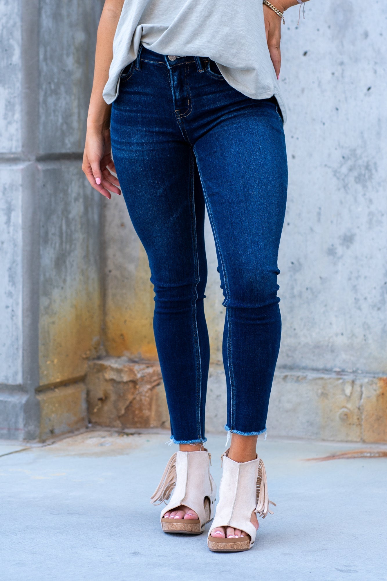 VERVET by Flying Monkey Jeans This comfortable stretchy denim has a calf-hugging fit, fray hem bottom, and zipper with a distressed hem. Skinny Cut, 30" Inseam* Mid Rise, 9" Front Rise* 98% COTTON, 2% POLYESTER Machine Wash Separately In Cold Water Stitching: Classic Fly: Zipper Style #: V2159D Contact us for any additional measurements or sizing.