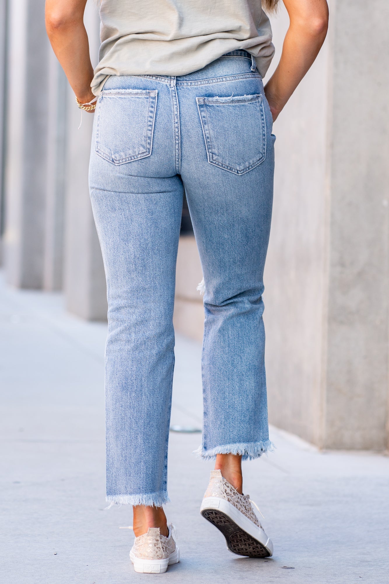 Flying Monkey Jeans Non-stretch denim with distressed detail and relaxed legs. Look fitted style with a hidden button-up and relaxed feel. Authentic rigid jeans with a vintage hem. Collection: Core Style Name: Apart Cut: Mom Fit, 28" Straight Rise: High Rise, 11" Front Rise 100% Cotton Machine Wash Separately In Cold Water Stitching: Classic Fly: Zipper Style #: Y3920 Contact us for any additional measurements or sizing.