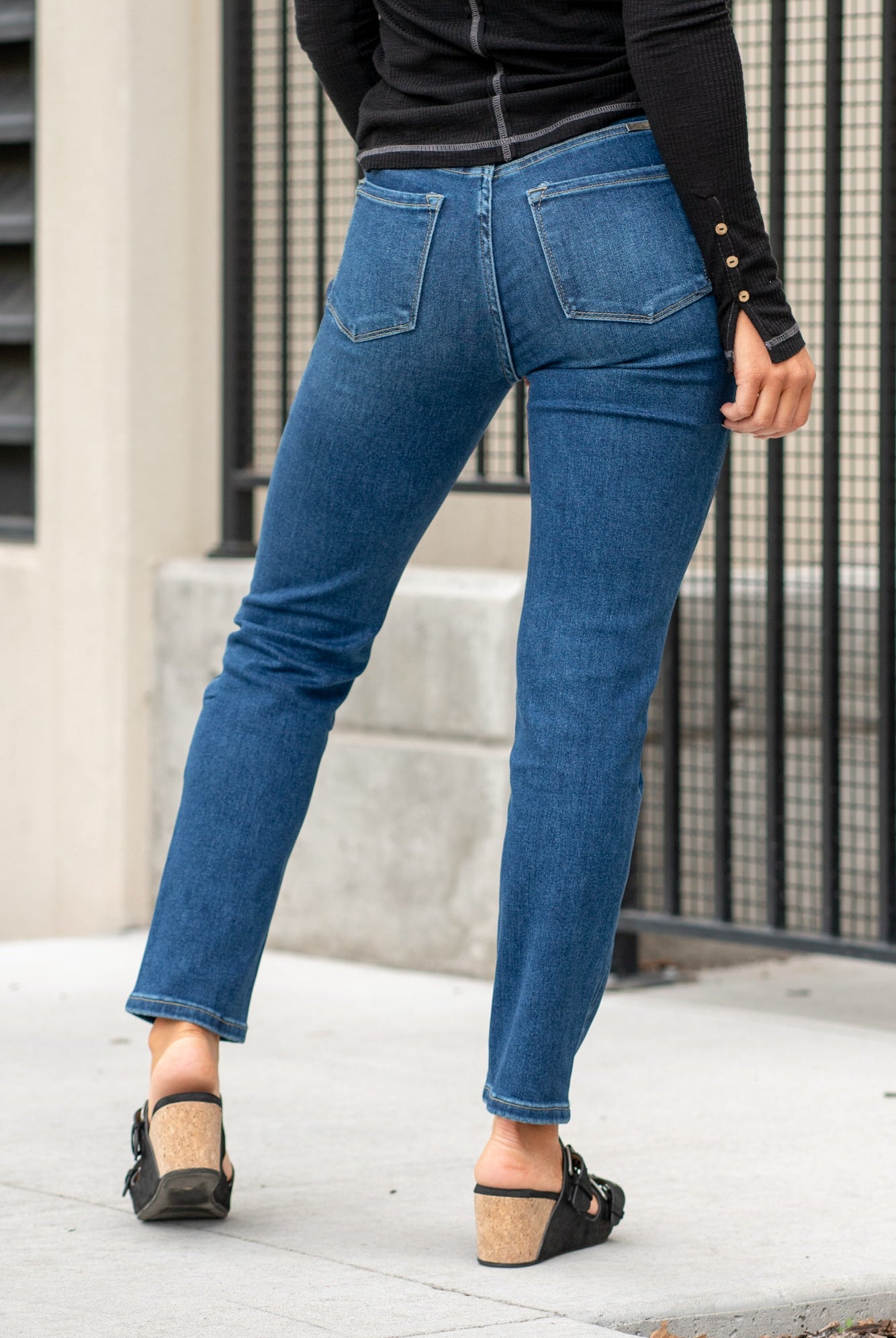 KanCan Jeans With a high waist and straight fit, these will be your go-to jeans that will never go out of style. Color: Dark Blue Cut: Straight Fit, 28.5" Inseam* Rise: High-Rise, 11" Front Rise* COTTON 75%, TENCEL 23%,SPANDEX 2% Fly: Zipper Style #: KC11252D Contact us for any additional measurements or sizing. *Measured on the smallest size, measurements may vary by size. Sarah wears a size 25 in jeans, a small in tops, and 8 in shoes. She is wearing size 25 in these jeans.