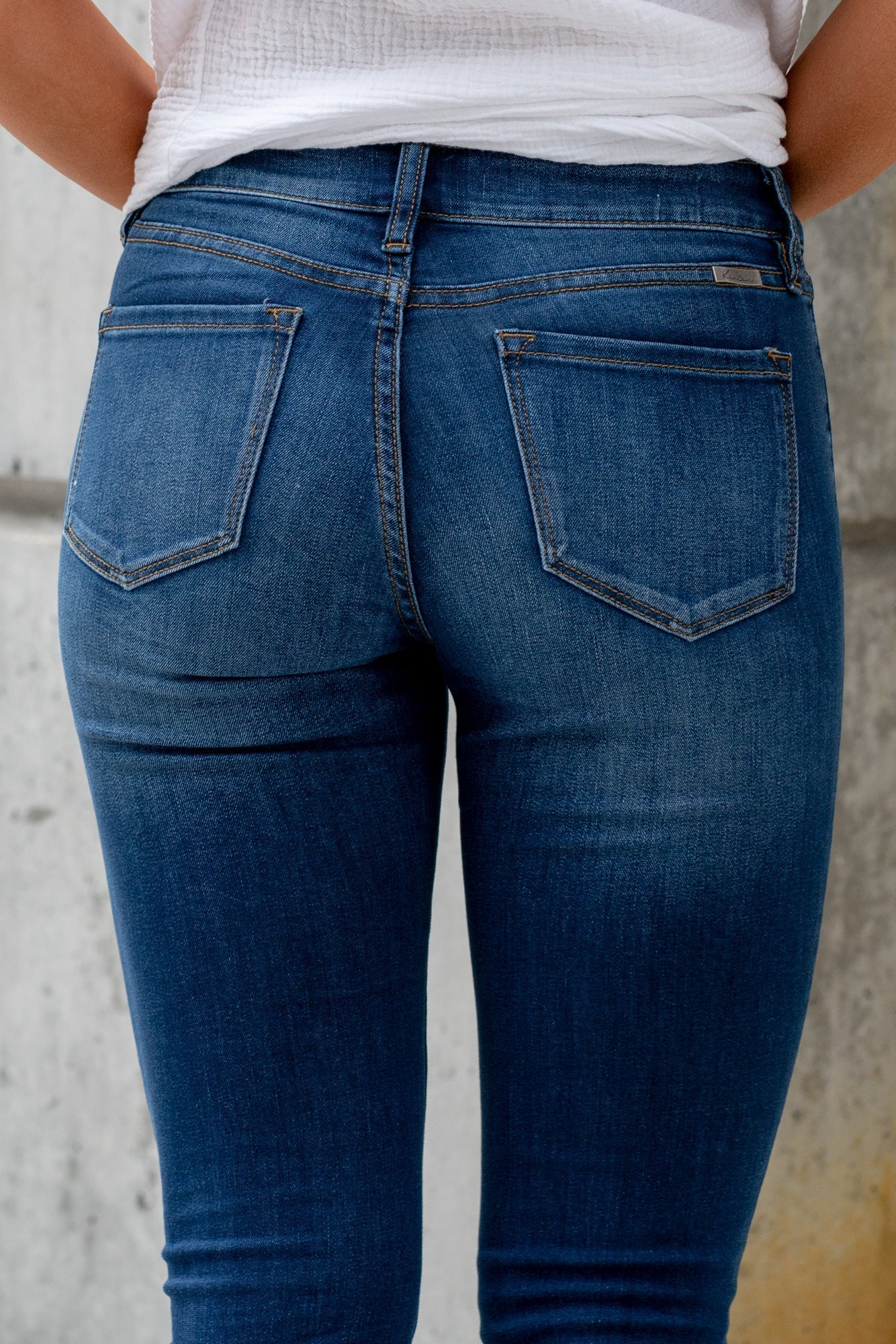 KanCan Jeans KanCan Stretch Level: Stretchy Color: Dark Wash Cut: Skinny, 29.5" Inseam Rise: Mid-Rise, 8.5" Front Rise Cotton 67%Polyester 25% Rayon 6% Spandex 2% Stitching: Classic Fly: Zipper Style #: KC7092D Contact us for any additional measurements or sizing. *Measured on the smallest size, measurements may vary by size. Sarah wears a size 25 in jeans, a small in tops, and 8 in shoes. She is wearing size 25 in these jeans.