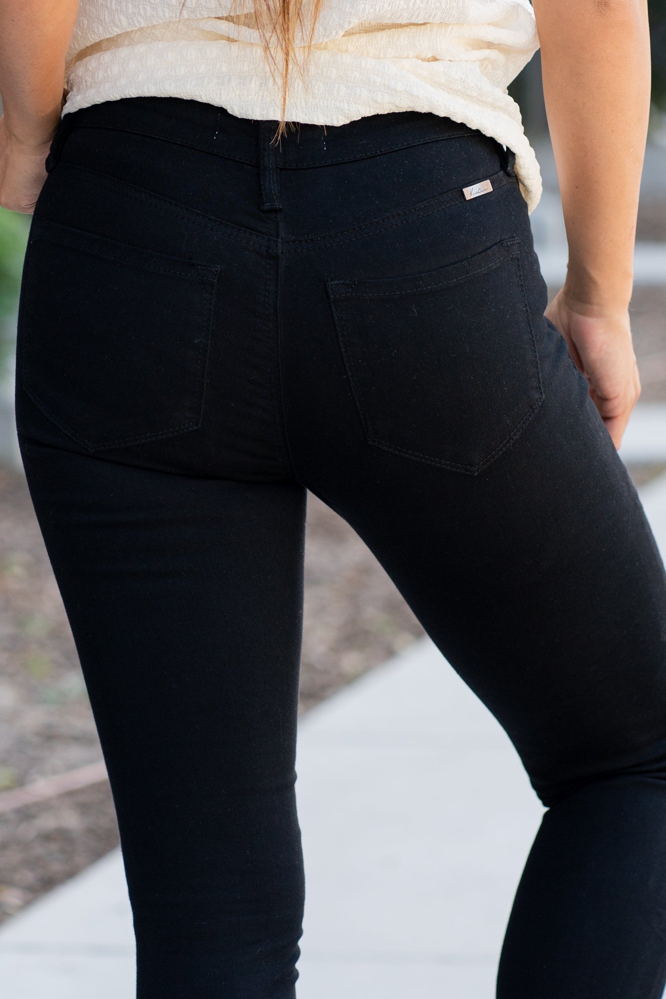 KanCan Jeans These are the staple black skinny jeans from KanCan. Collection: Core Style Color: Black Cut: Ankle Skinny, 28" Inseam Rise: High-Rise, 9.5" Front Rise Material: 65% Cotton 33% Rayon 2% Elastane Stitching: Classic Fly: Zipper Style #: KC6009BK Contact us for any additional measurements or sizing *Measured on the smallest size, measurements may vary by size. Alyssa wears a size 25 in jeans, a small in tops, and 8 in shoes. She is wearing size 3 in these jeans.