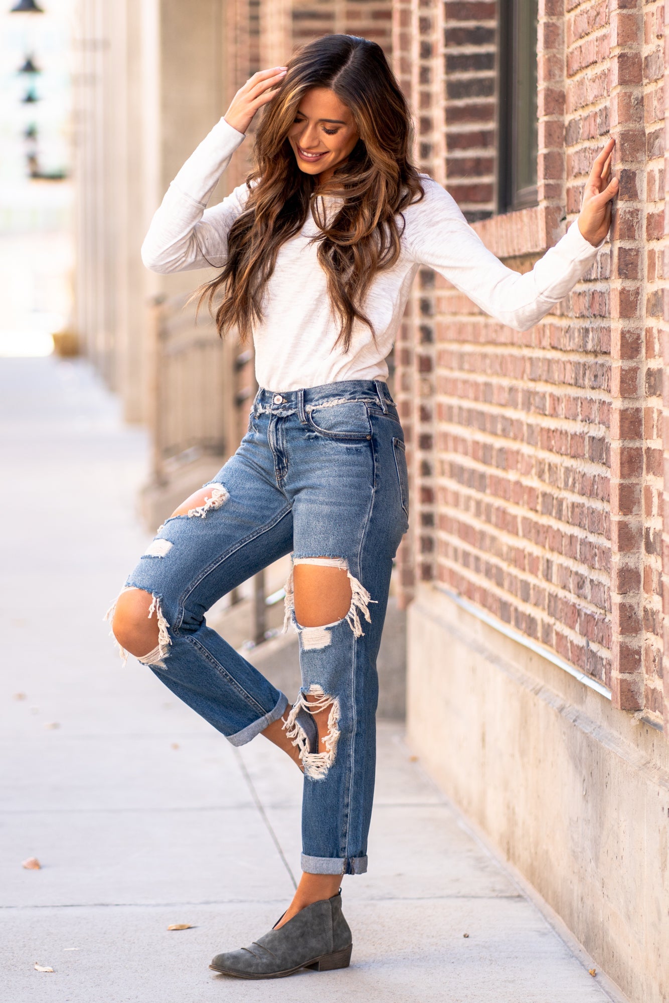 KanCan Jeans These mid-rise boyfriend jeans hit at exactly the right spot on your waist. With 100% cotton and no stretch, these will mold to your body as you wear KanCan Stretch Level: Comfort Stretch Color: Medium Blue Wash Cut: Boyfriend, 27" Inseam Rise: Mid-Rise, 9" Front Rise 100% Cotton Stitching: Classic Fly: Zipper Style #: KC70010M Contact us for any additional measurements or sizing.