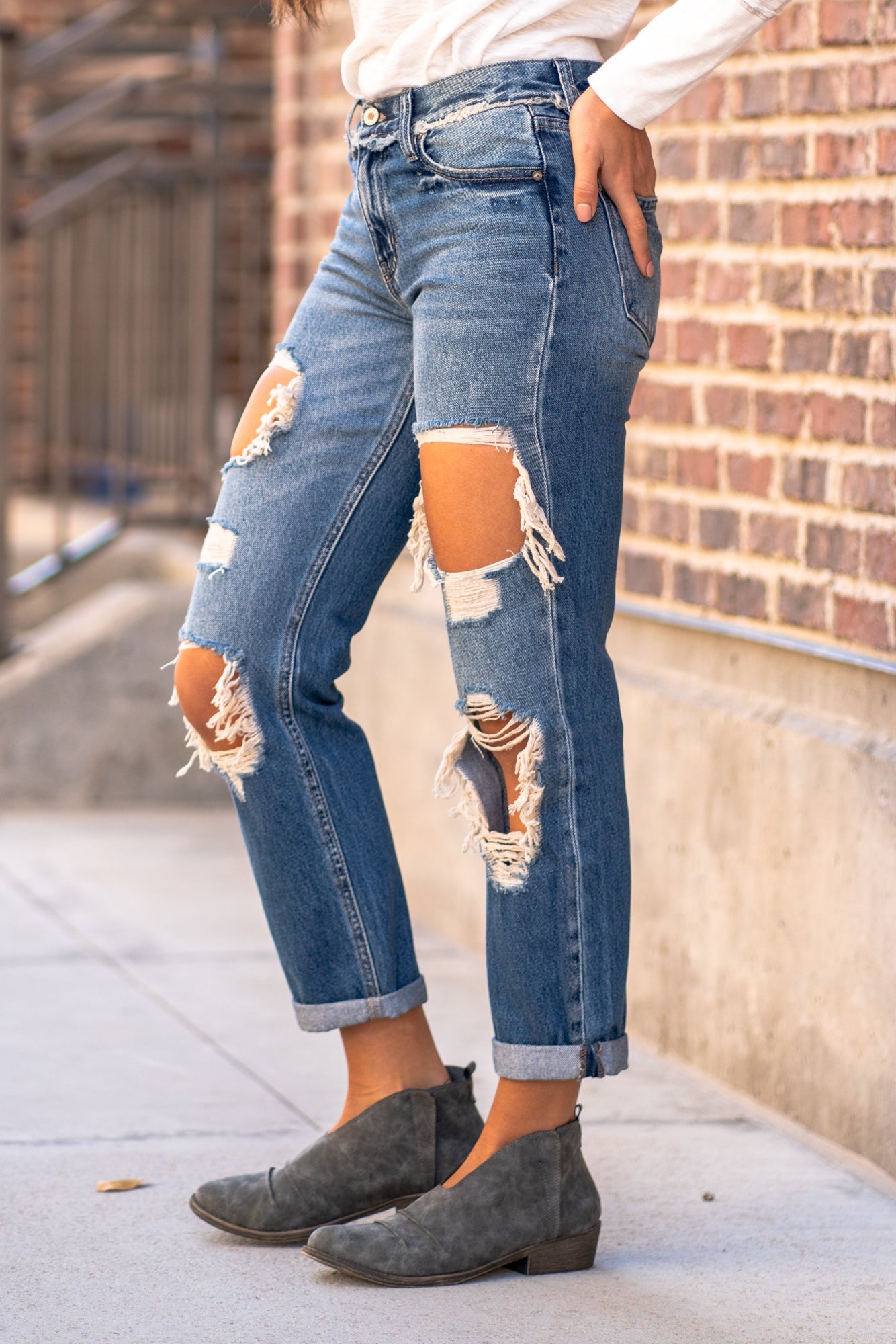 KanCan Jeans These mid-rise boyfriend jeans hit at exactly the right spot on your waist. With 100% cotton and no stretch, these will mold to your body as you wear KanCan Stretch Level: Comfort Stretch Color: Medium Blue Wash Cut: Boyfriend, 27" Inseam Rise: Mid-Rise, 9" Front Rise 100% Cotton Stitching: Classic Fly: Zipper Style #: KC70010M Contact us for any additional measurements or sizing.