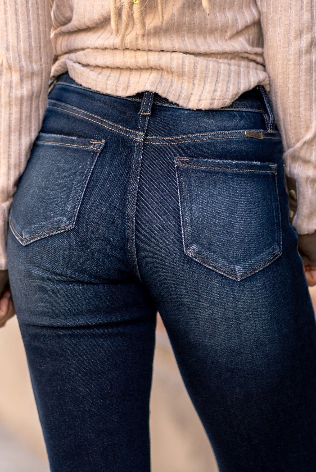 KanCan Jeans Color: Dark Wash Cut: Ankle Skinny, 27.5" Inseam* Rise: High Rise, 9.5" Front Rise* COTTON 94% POLYESTER 4% SPANDEX 2% Fly: Exposed Button Fly Style #: KC7117D Contact us for any additional measurements or sizing. *Measured on the smallest size, measurements may vary by size.