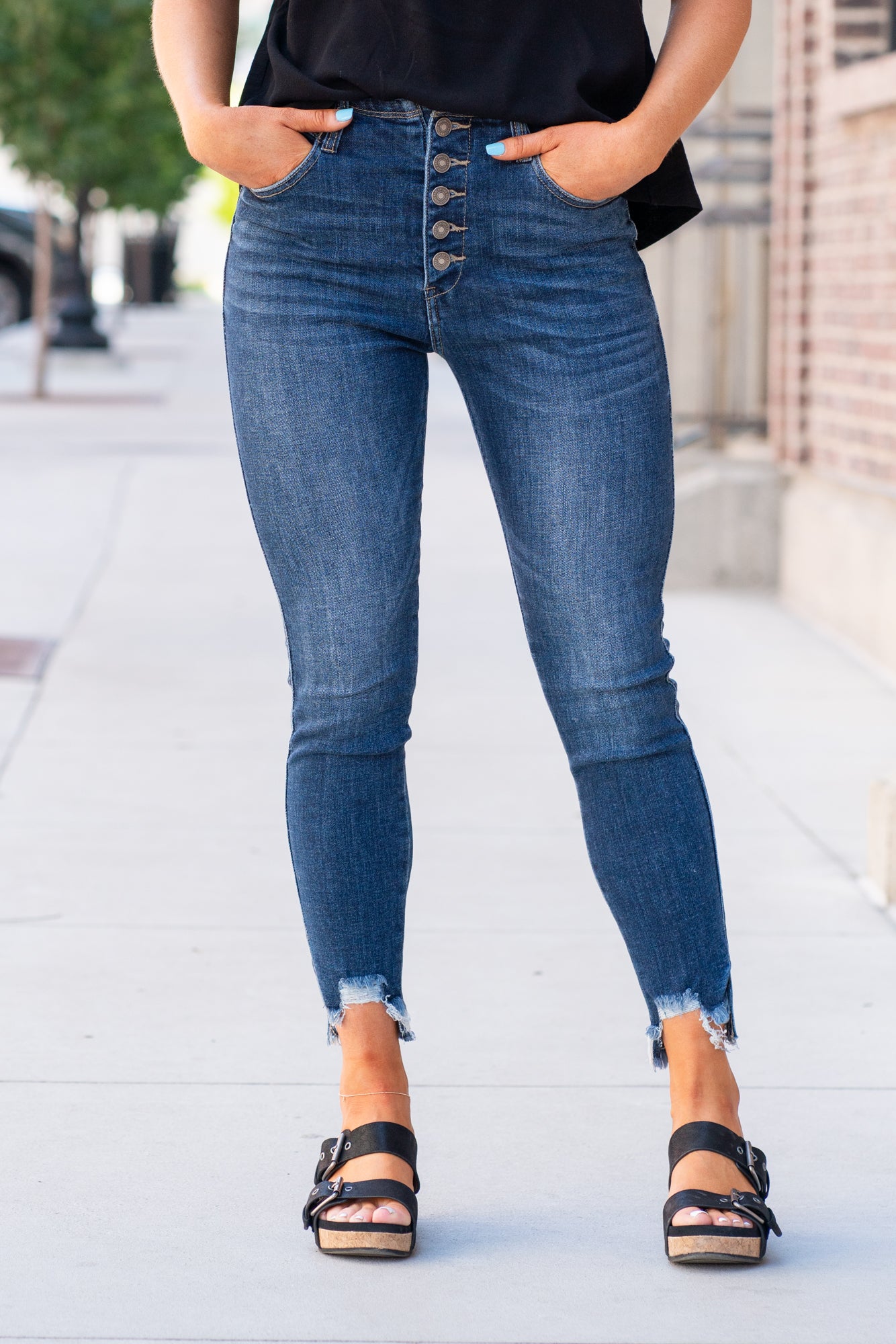 KanCan Jeans Color: Dark Wash Ankle Skinny, 27" Inseam* High Rise, 11" Front Rise* Frayed Hem Ankle with Ripped Distress 93% COTTON, 6% POLYESTER, 1% SPANDEX Fly: Exposed Button Fly Style #: KC2517D Contact us for any additional measurements or sizing. *Measured on the smallest size, measurements may vary by size.