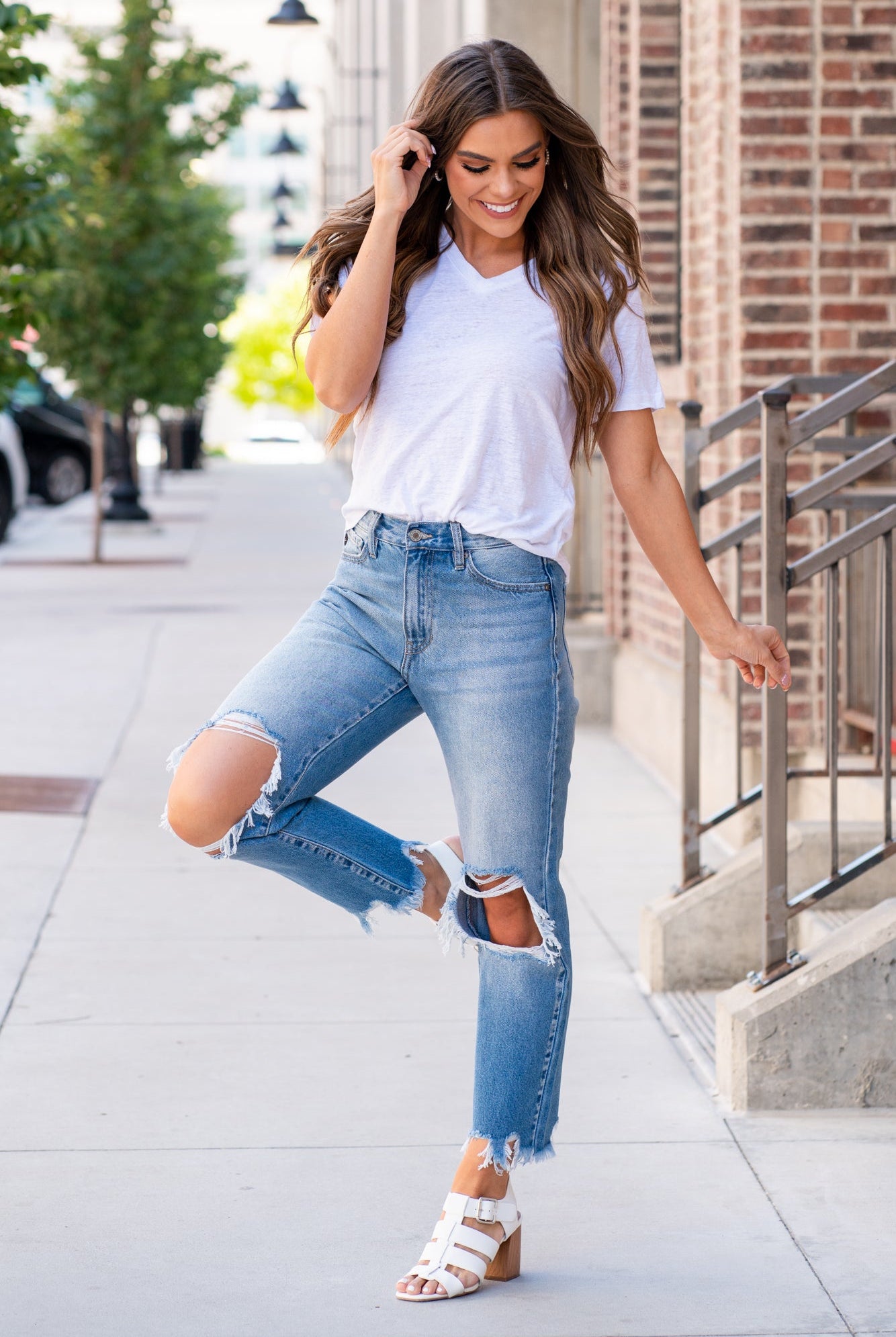 KanCan Jeans With a high waist and mom fit, these will be your go-to jeans that will never go out of style. Color: Medium Blue Cut: Mom Fit, 26.5" Inseam* Rise: High-Rise, 11" Front Rise* 100% Cotton Fly: Zipper Style #: KC7180M Contact us for any additional measurements or sizing. *Measured on the smallest size, measurements may vary by size.