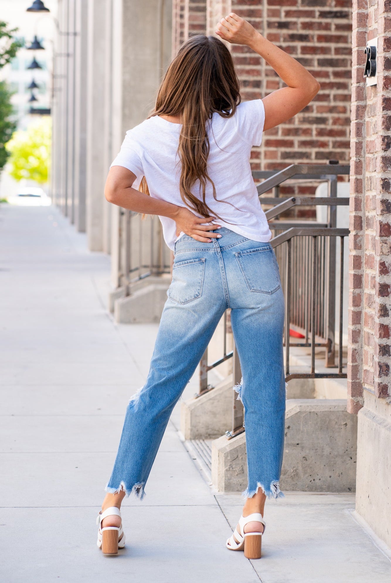 KanCan Jeans  With a high waist and mom fit, these will be your go-to jeans that will never go out of style. Color: Medium Blue  Cut: Mom Fit, 26.5" Inseam* Rise: High-Rise, 11" Front Rise* 100% Cotton Fly: Zipper Style #: KC7180M Contact us for any additional measurements or sizing.  *Measured on the smallest size, measurements may vary by size.