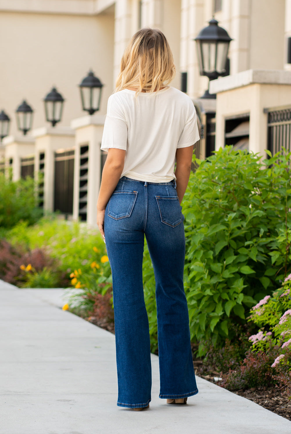 KanCan Jeans  You will love the way these flare cuts fit your curves. Dress up with heels and a cute flutter sleeve top for a night out.  Collection: Spring 2021 Color: Medium Blue Cut: Flare Cut, 34" Inseam Rise: High-Rise, 11" Front Rise 93% COTTON 5% POLYESTER 2% SPANDEX Stitching: Classic Fly: Zipper Style #: KC9248M Contact us for any additional measurements or sizing.