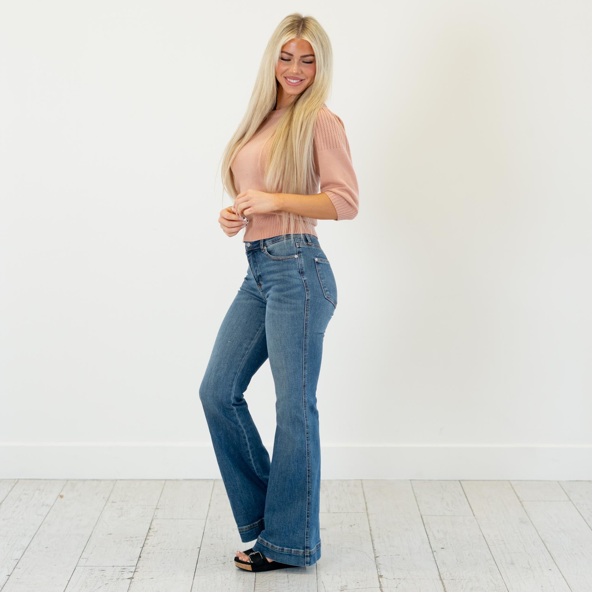 Judy Blue
High-rise tummy control, double-button waist, soft stretch flare—your new sculpting denim essential.
Color: Medium Blue
Cut: Flare, 10.75" Inseam*
Rise: High Rise, 33" Front Rise*
Material: 91% Cotton, 7% Polyester, 2% Spandex
Stitching: Classic
Fly: Zipper
Style #: Style # JB881018 | # 881018
*Measured on the smallest size, measurements may vary by size.
Contact us for any additional measurements or sizing.
