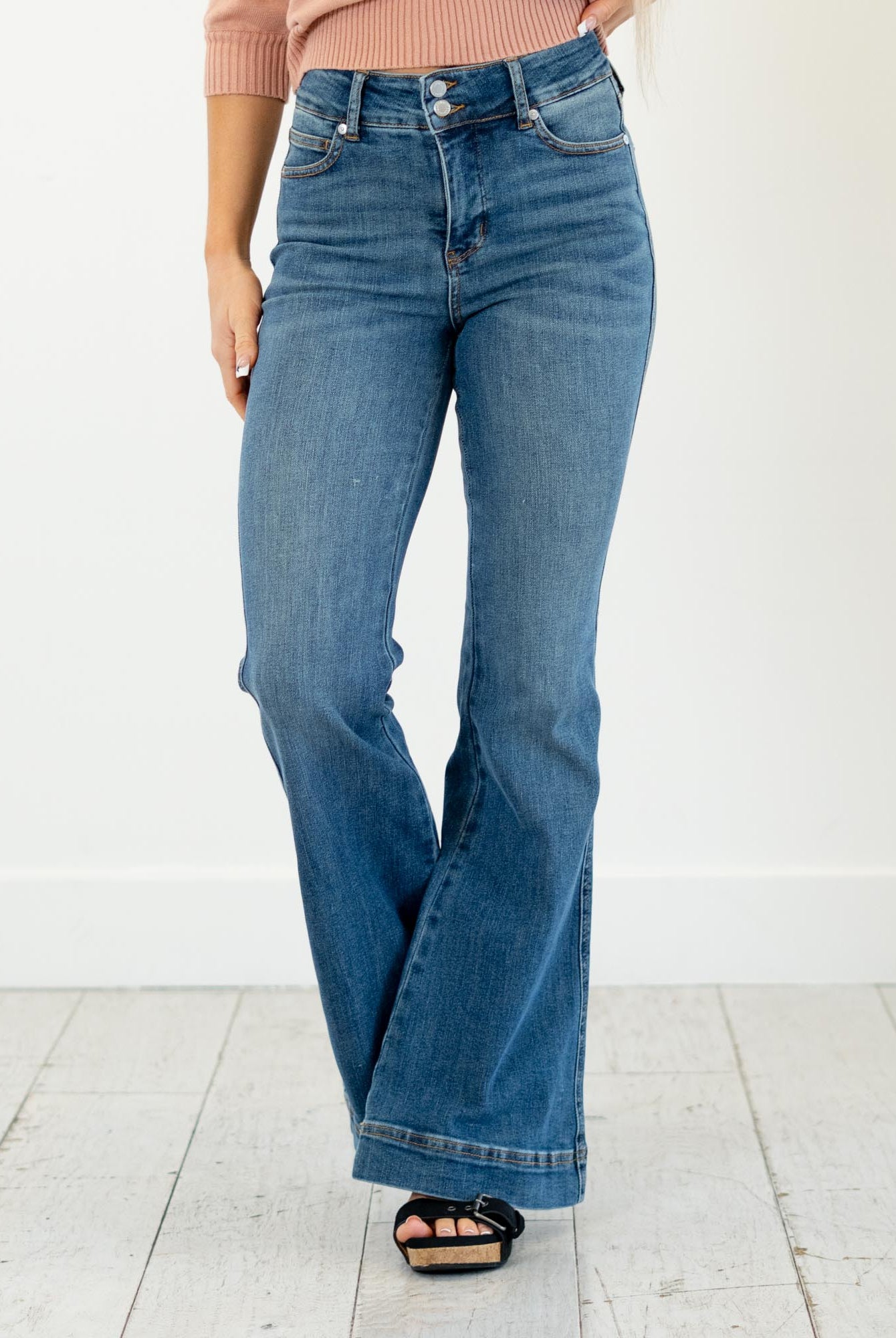 Judy Blue
High-rise tummy control, double-button waist, soft stretch flare—your new sculpting denim essential.
Color: Medium Blue
Cut: Flare, 10.75" Inseam*
Rise: High Rise, 33" Front Rise*
Material: 91% Cotton, 7% Polyester, 2% Spandex
Stitching: Classic
Fly: Zipper
Style #: Style # JB881018 | # 881018
*Measured on the smallest size, measurements may vary by size.
Contact us for any additional measurements or sizing.