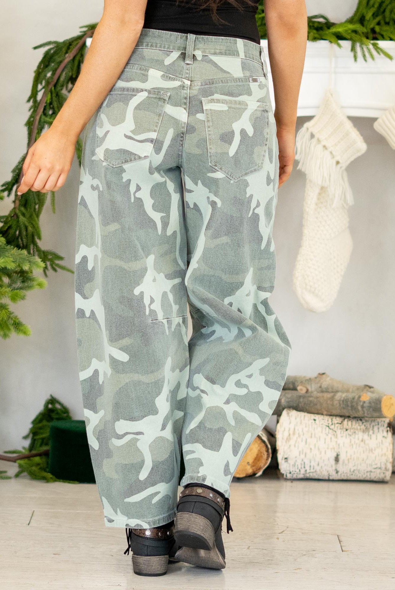 Show out in our Xena High Rise Camo Horseshoe Jeans — a bold, sculptural silhouette that instantly elevates any outfit. Designed to sit comfortably at the high rise, this horseshoe shape curves wide through the thigh, then narrows back in toward the ankle for that oversized, baggy-but-polished look everyone’s obsessed with.
The allover camo print adds a street-style twist while still feeling wearable for everyday fits. Finished with a classic single-button closure, zip fly, and traditional 5-pocket styling