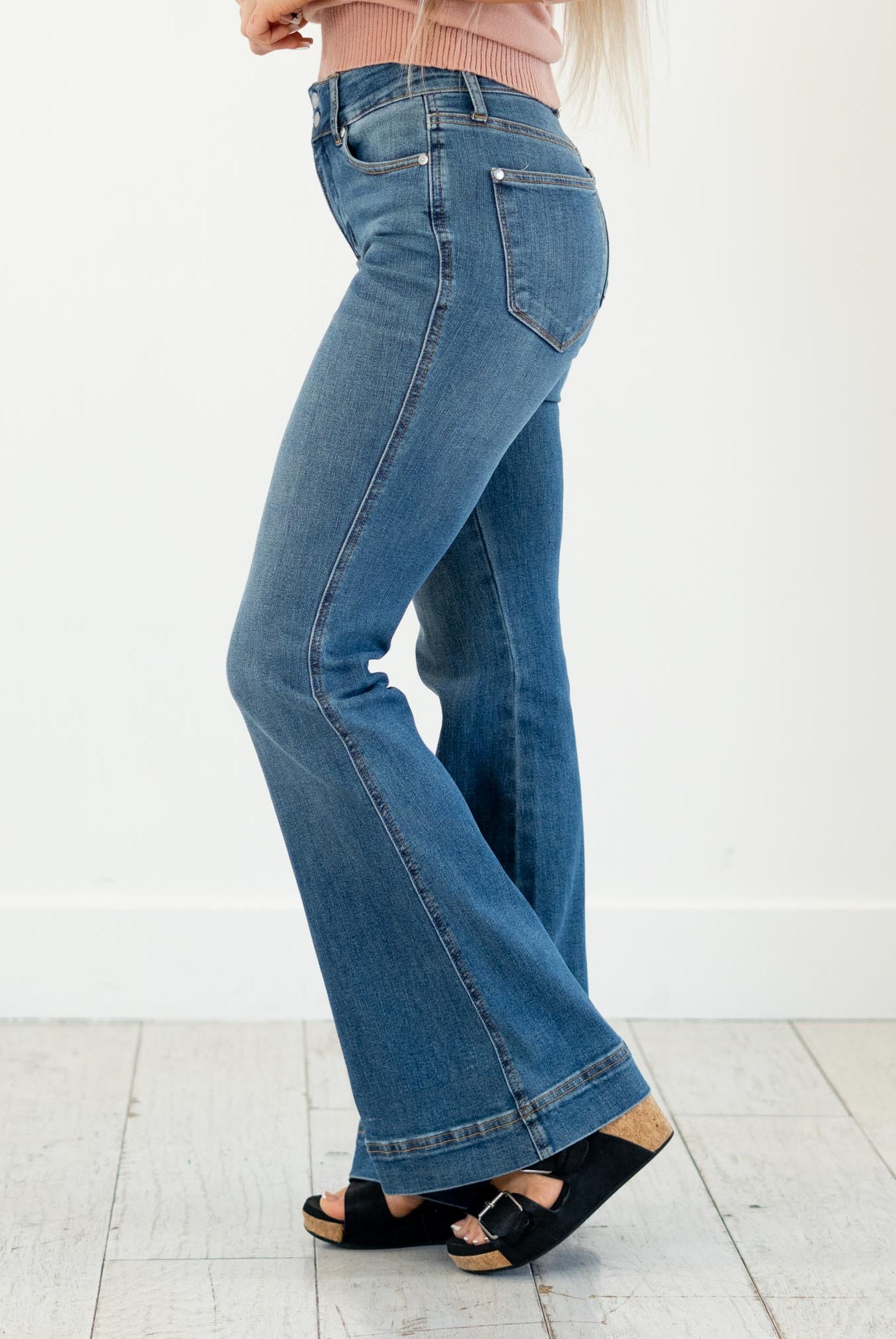 Judy Blue
High-rise tummy control, double-button waist, soft stretch flare—your new sculpting denim essential.
Color: Medium Blue
Cut: Flare, 10.75" Inseam*
Rise: High Rise, 33" Front Rise*
Material: 91% Cotton, 7% Polyester, 2% Spandex
Stitching: Classic
Fly: Zipper
Style #: Style # JB881018 | # 881018
*Measured on the smallest size, measurements may vary by size.
Contact us for any additional measurements or sizing.