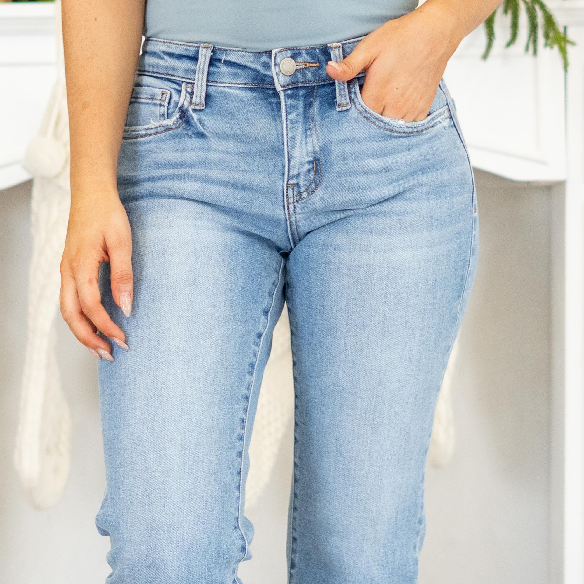 VERVET by Flying Monkey Jeans
Meet your new everyday denim. The Smartest Mid Rise Straight Crop Jeans are made with soft comfort stretch for a fit that moves with you. Designed with a flattering mid rise, lightly distressed details, and a clean raw hem, these medium-wash straight legs give you that easy, timeless look. Finished with a cropped length for a modern touch, they’re the perfect pair for any season.
Color Name: Smartest
Color: Medium Blue
Cut: Cropped Straight Leg, 27" Inseam*
Rise