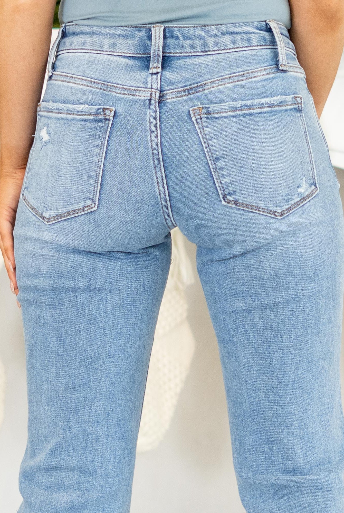 VERVET by Flying Monkey Jeans
Meet your new everyday denim. The Smartest Mid Rise Straight Crop Jeans are made with soft comfort stretch for a fit that moves with you. Designed with a flattering mid rise, lightly distressed details, and a clean raw hem, these medium-wash straight legs give you that easy, timeless look. Finished with a cropped length for a modern touch, they’re the perfect pair for any season.
Color Name: Smartest
Color: Medium Blue
Cut: Cropped Straight Leg, 27" Inseam*
Rise