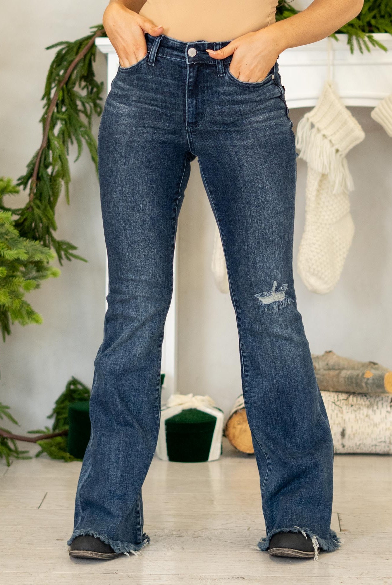 Judy Blue
Dark wash, soft stretch, just-enough destruction. A sleek flare with a frayed hem for that effortlessly lived-in vibe.
Color: Dark Blue Wash
Cut: Flare, 34" Inseam*
Rise: Mid Rise, 9.5" Front Rise*
Material: 93%Cotton / 6% Polyester / 1% Spandex
Stitching: Classic
Fly: Zipper
Style #: Style # JB82681 | # 82681
*Measured on the smallest size, measurements may vary by size.
Contact us for any additional measurements or sizing.