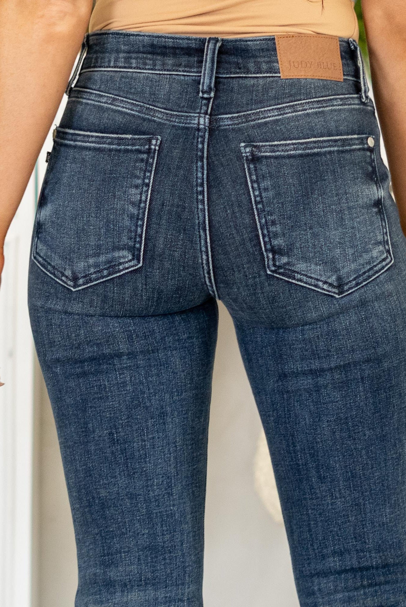 Judy Blue
Dark wash, soft stretch, just-enough destruction. A sleek flare with a frayed hem for that effortlessly lived-in vibe.
Color: Dark Blue Wash
Cut: Flare, 34" Inseam*
Rise: Mid Rise, 9.5" Front Rise*
Material: 93%Cotton / 6% Polyester / 1% Spandex
Stitching: Classic
Fly: Zipper
Style #: Style # JB82681 | # 82681
*Measured on the smallest size, measurements may vary by size.
Contact us for any additional measurements or sizing.