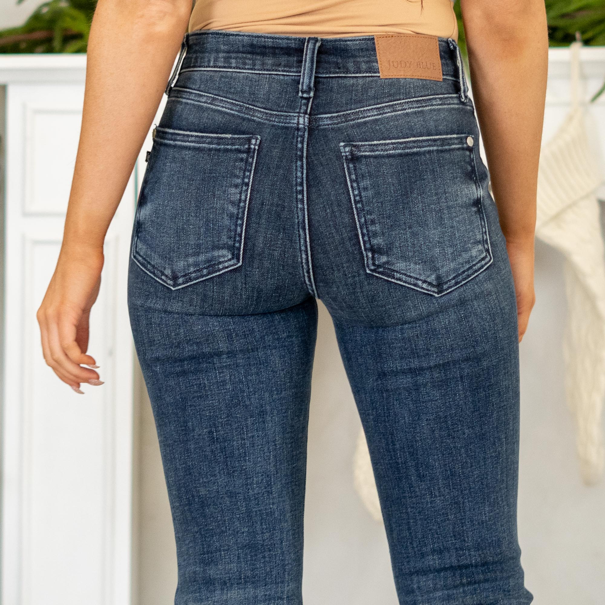 Judy Blue
Dark wash, soft stretch, just-enough destruction. A sleek flare with a frayed hem for that effortlessly lived-in vibe.
Color: Dark Blue Wash
Cut: Flare, 34" Inseam*
Rise: Mid Rise, 9.5" Front Rise*
Material: 93%Cotton / 6% Polyester / 1% Spandex
Stitching: Classic
Fly: Zipper
Style #: Style # JB82681 | # 82681
*Measured on the smallest size, measurements may vary by size.
Contact us for any additional measurements or sizing.